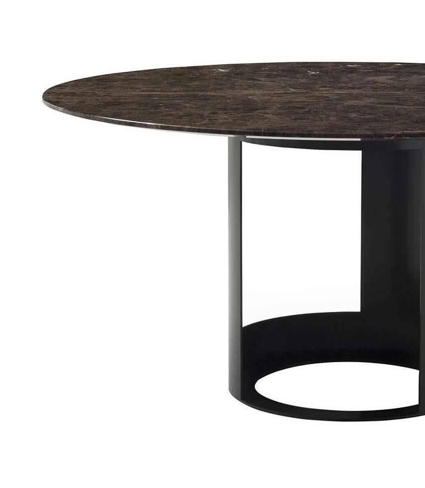 Part of the Ci collection, this dining table is a striking example of exquisite craftsmanship. Its base in metal has a cylindrical shape that boasts cutouts creating a light and modern feel to the piece. The top in beveled Brown Emperadorn marble