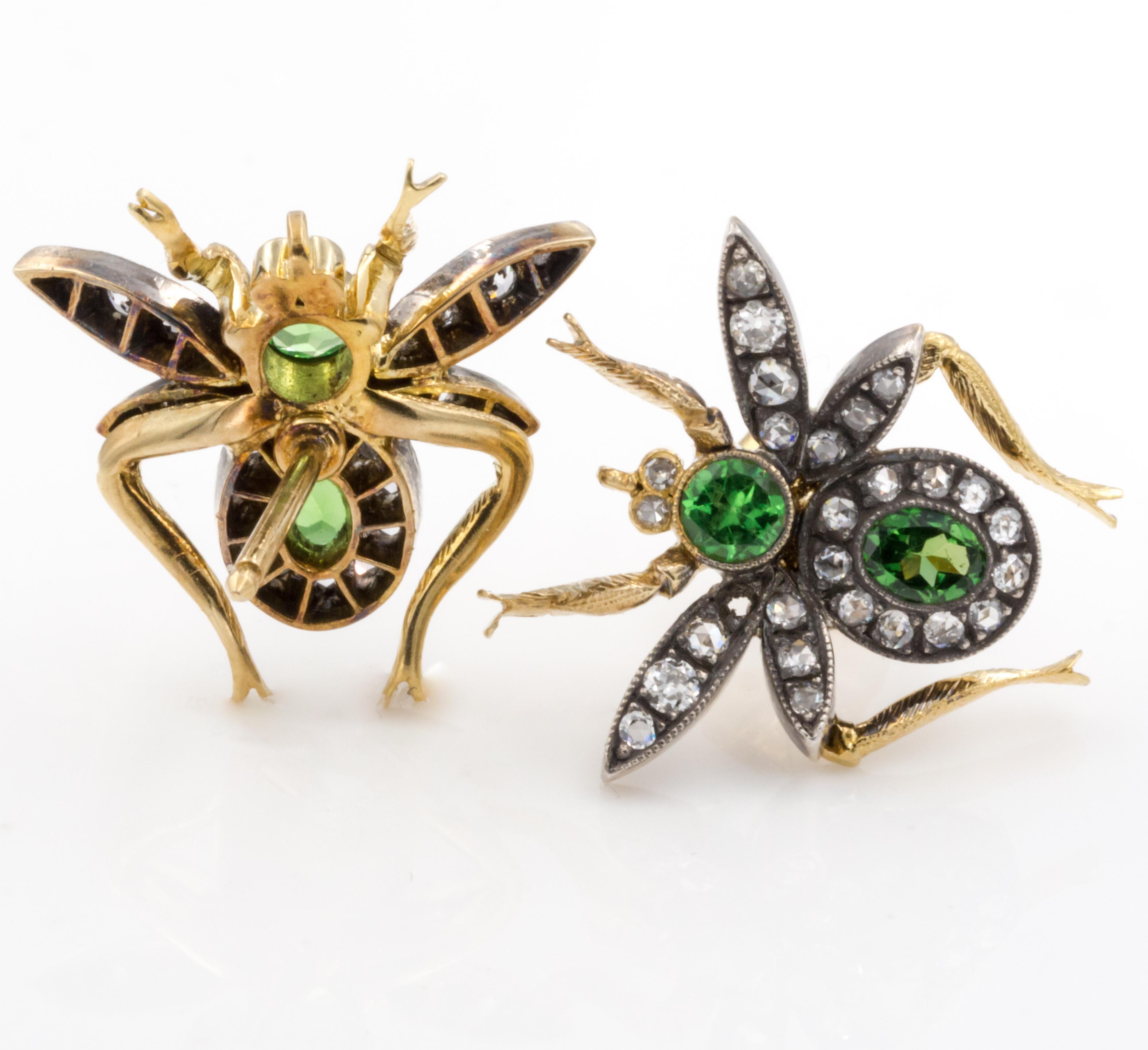 These whimsical fly stud earrings are set with diamonds and green garnets in 18k yellow gold topped with antiqued silver giving it the beautiful vintage look.

Diamond: 0.72ct
Green Garnets: 1.09ct
Metal: 18k Yellow Gold, Silver
Dimensions: 0.75 in