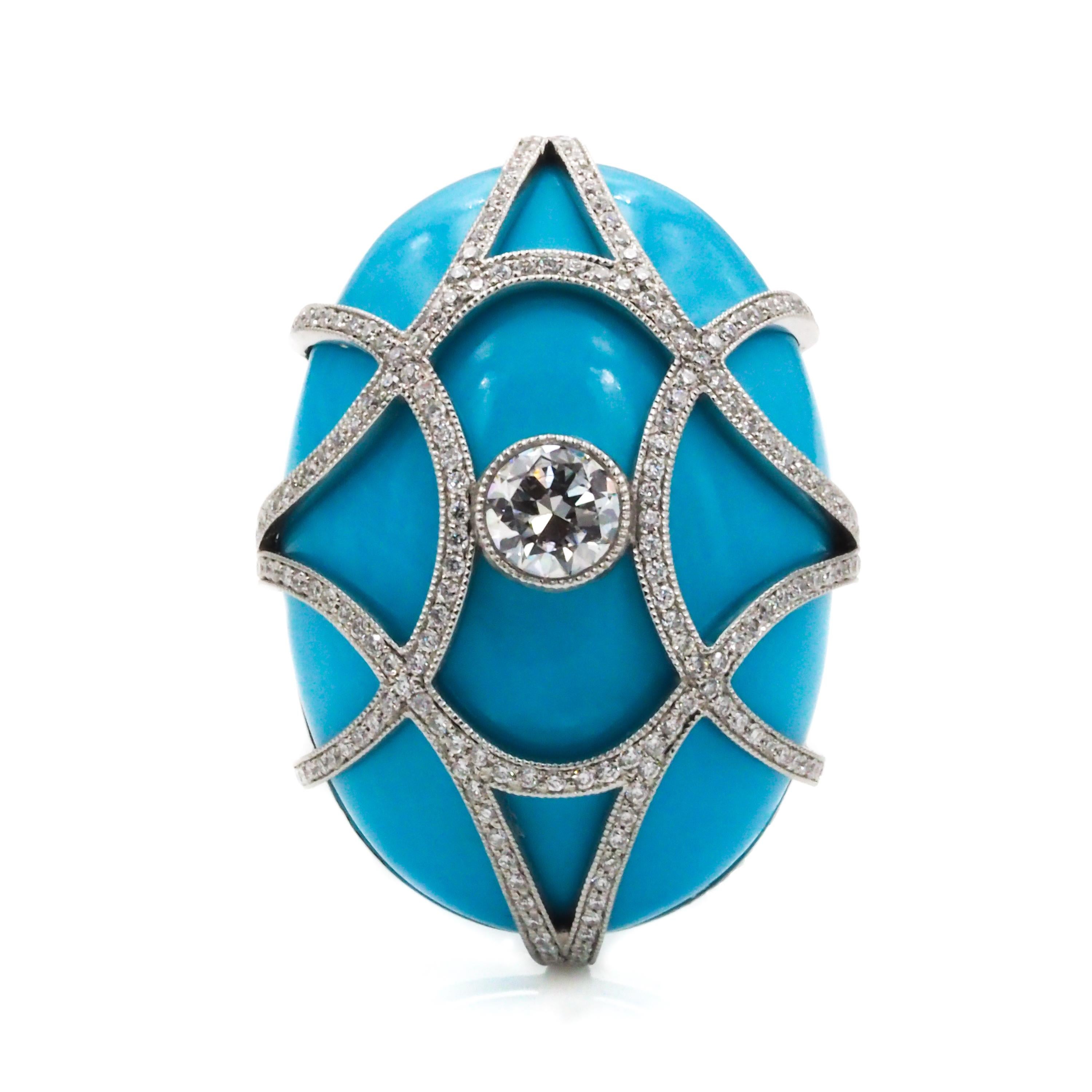 This stunning platinum cocktail ring features a large cabochon oval turquoise within a cage of diamonds. 

Turquoise: 45.68ct
Center Diamond: 0.36ct
Melee Diamonds: 0.68ct
Metal: Platinum
Ring Size: 6 (can be resized)

Original piece by Cicada,