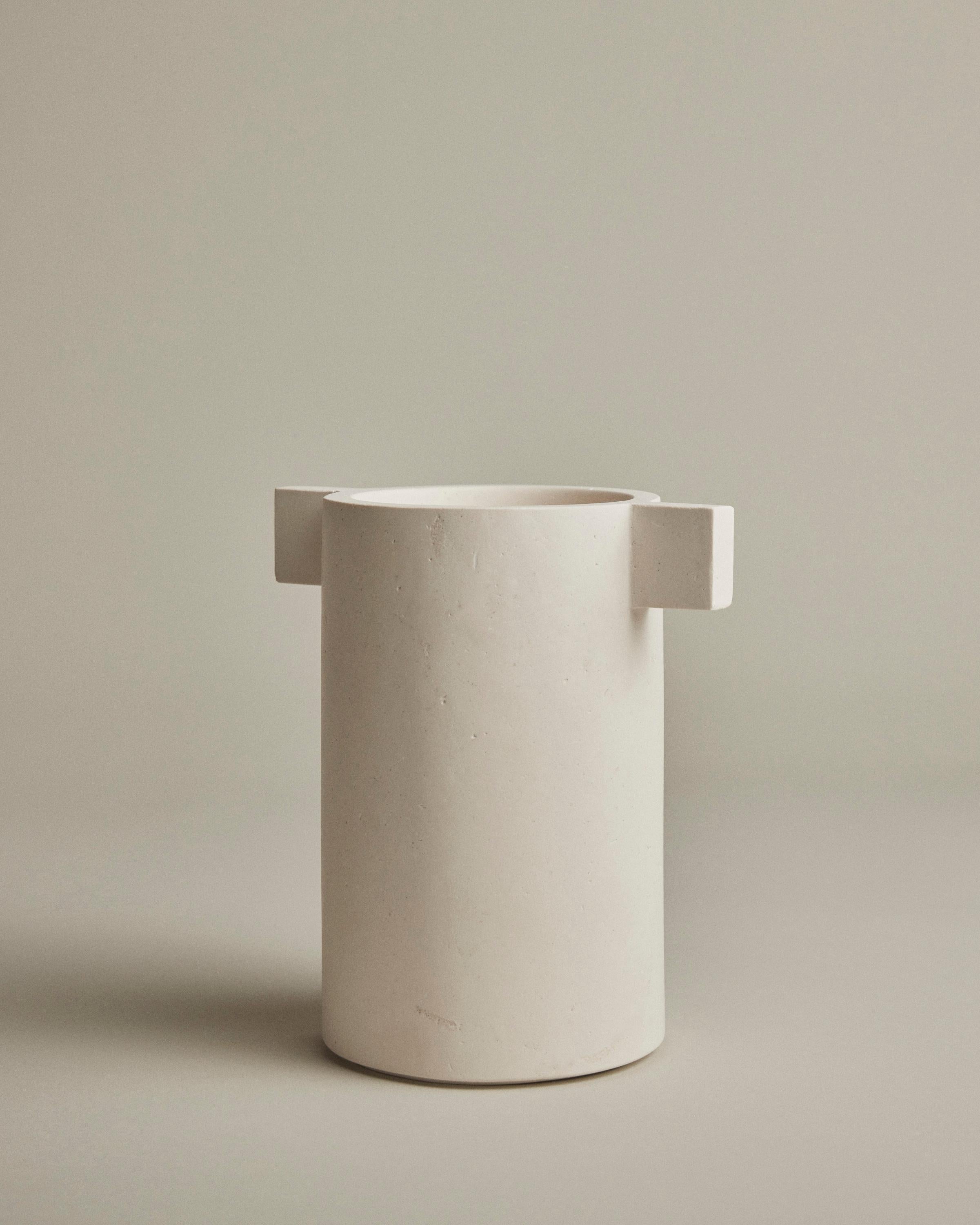 Designed as part of the Cicco Collection by Amee Allsop for the brand EIMI, this vessel is carved from a solid block of Turkish limestone which is renowned for its elegant purity and refined texture.

This sculptural object is a modernist design