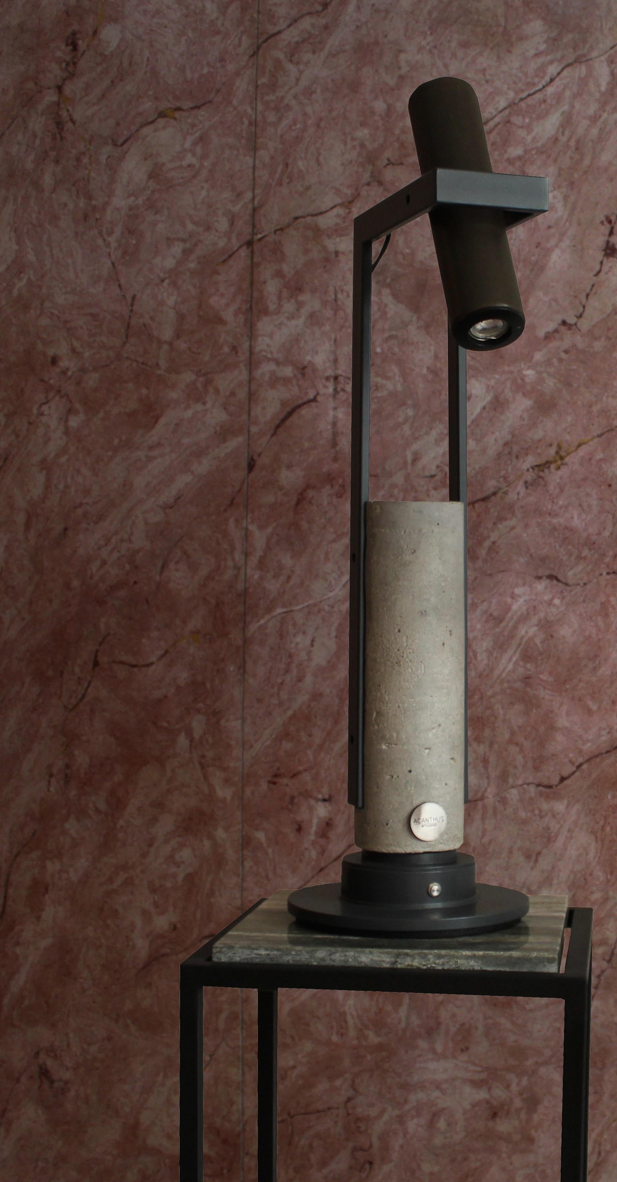Ciclope Grey Concrete Table Lamp by Acanthus Studio Roma
Limited Edition
Dimensions: D 22 x W 30 x H 80 cm.
Materials: Steel, leather, and grey concrete. 

This table lamp is all about classy contrasts and will fit in effortlessly as part of a