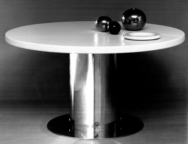 Cidonio is the name of table projected in 1966 by Antonia Astori tot he Driade:
a table with one steel base and glass or polished wood top.
This version is polished withe wood top., this table is the first edition.
The top can later be replaced