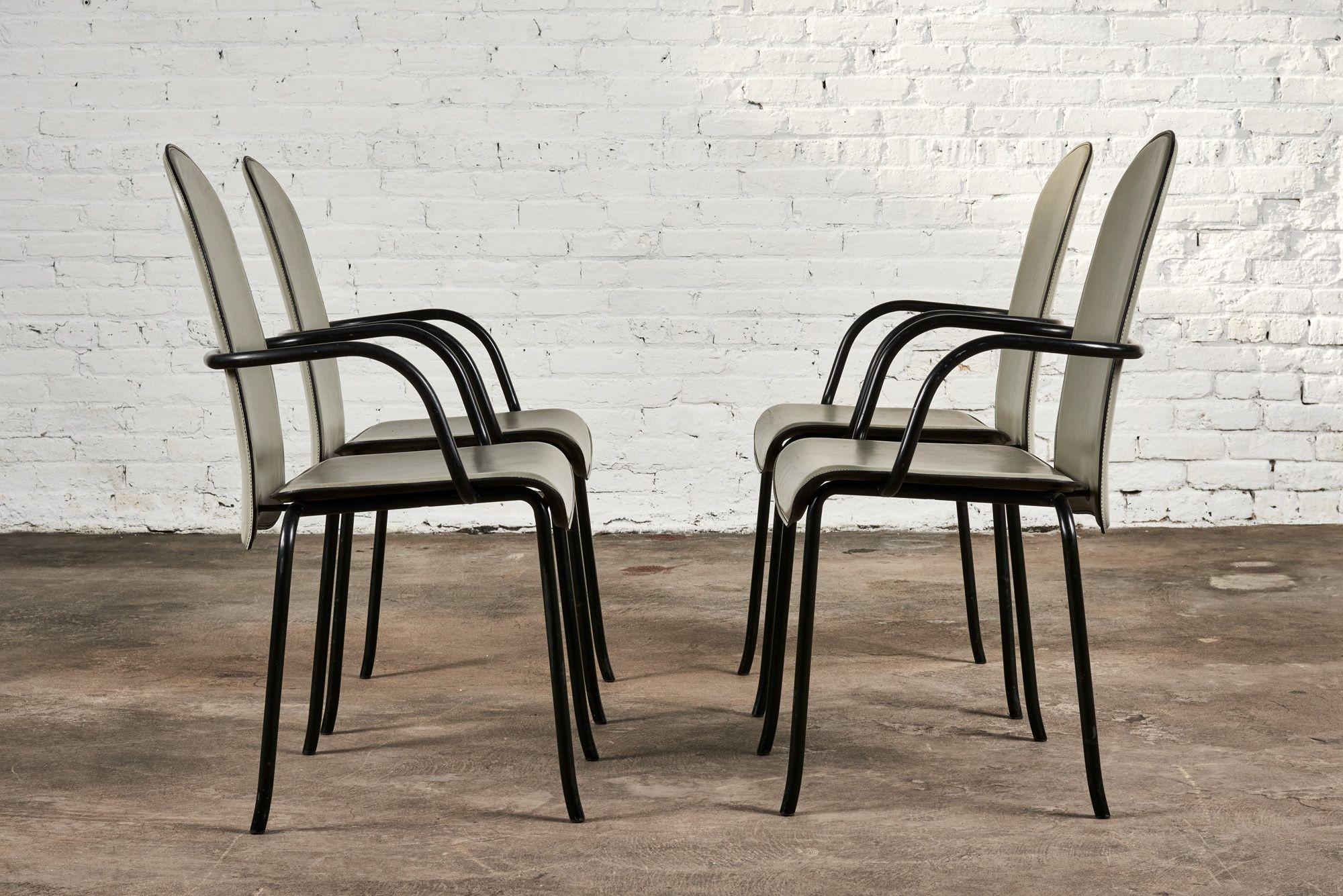 Cidue Italian grey leather and black enameled steel dining chairs, 1970. Designed by Giorgio Cattelan. Original leather and metal frames in excellent condition.