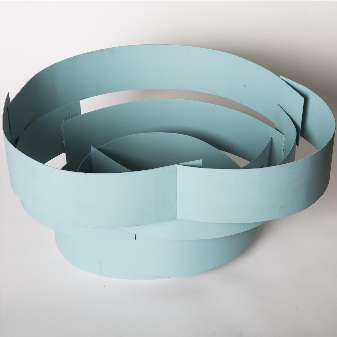 This handmade metal piece has been varnished a light blue color. Each piece is a one-of-a-kind and varies slightly in size and shape. Sculptural and strong, this piece brings the signature Sciortino style into your home. 



  