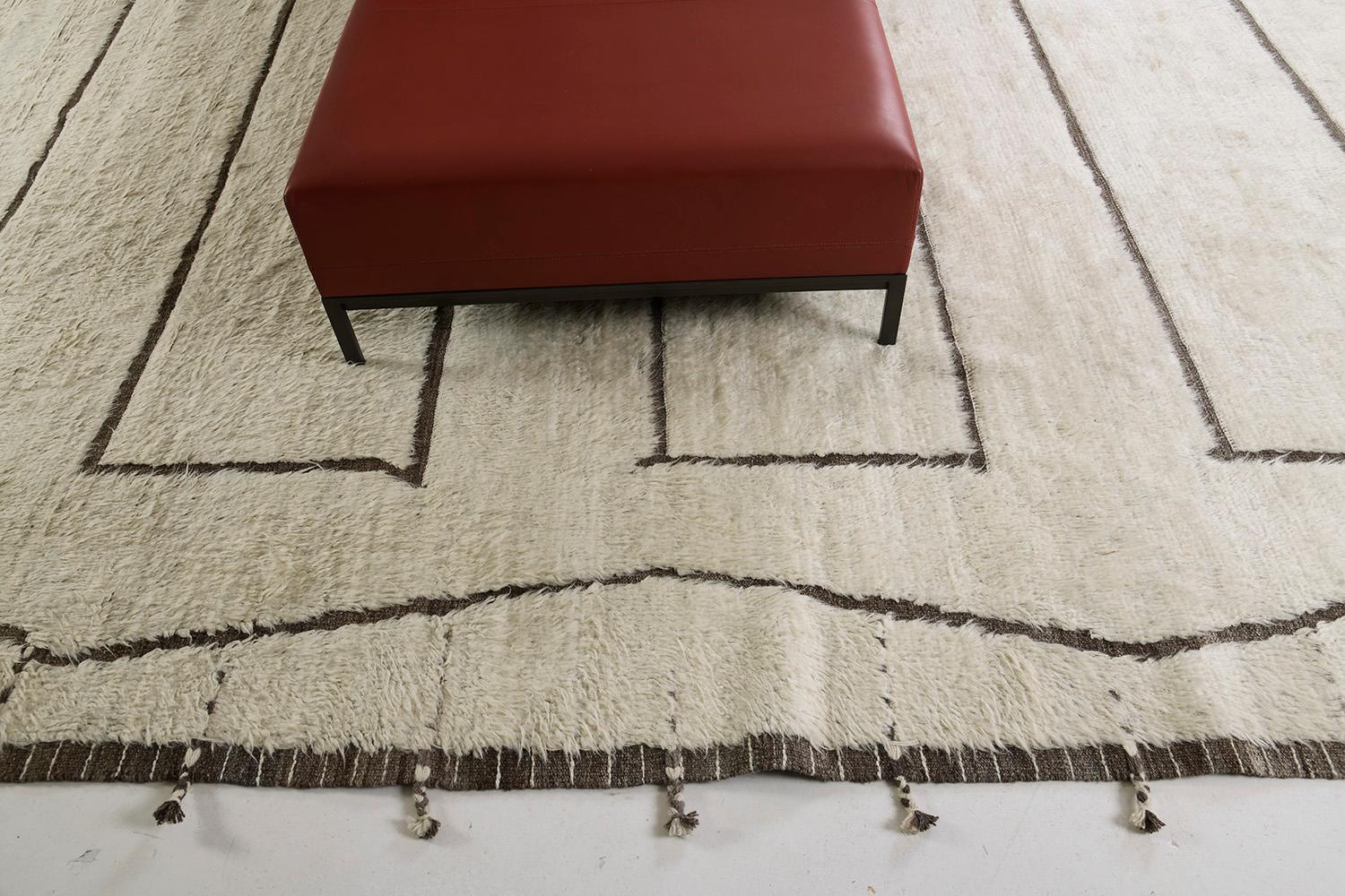 Cierzo is a signature collection of California. It is a handwoven luxurious wool rug made of remarkable natural brown design elements. Haute Bohemian collection: designed in Los Angeles named for the winds knitting together seasons, trees, dwellers