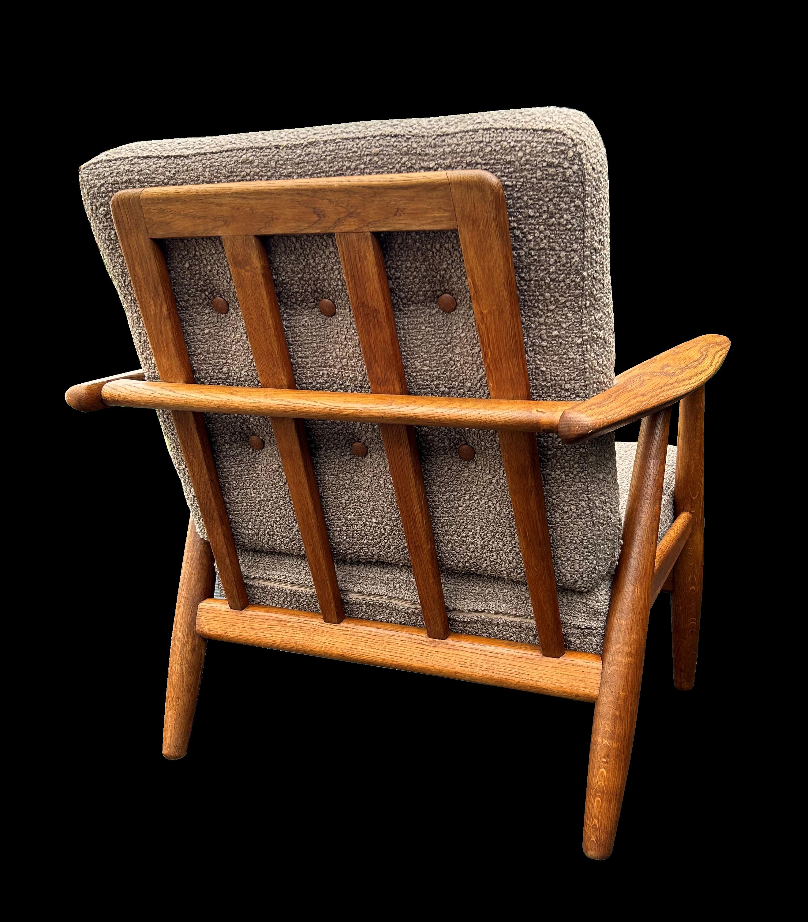 A very nice example of this classic chair, freshly uphosltered in Mocha coloured Boucle fabric.
The frame in Oak and  all in great condition.