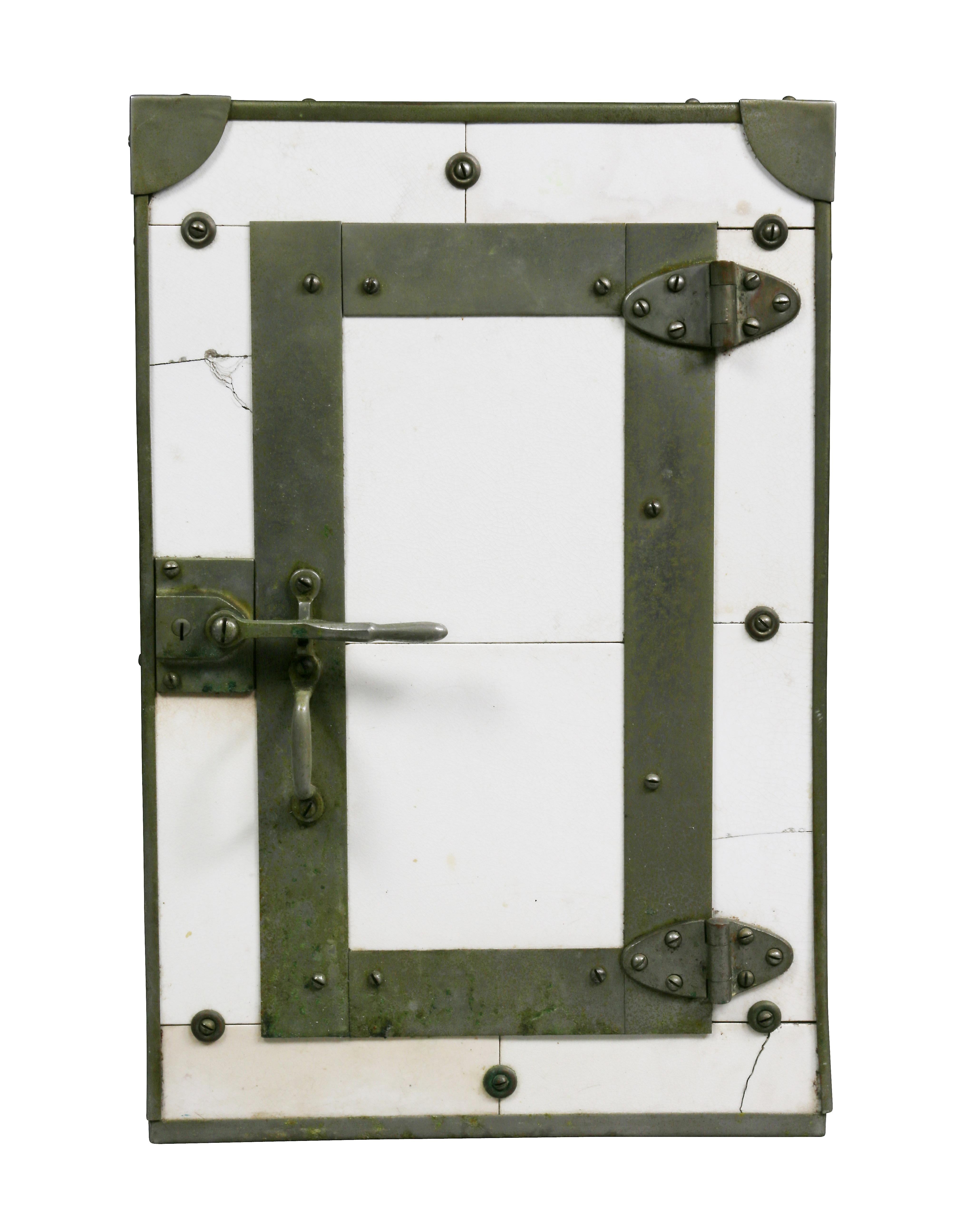 Rectangular form with nickel plated mounts with door marked on inside 