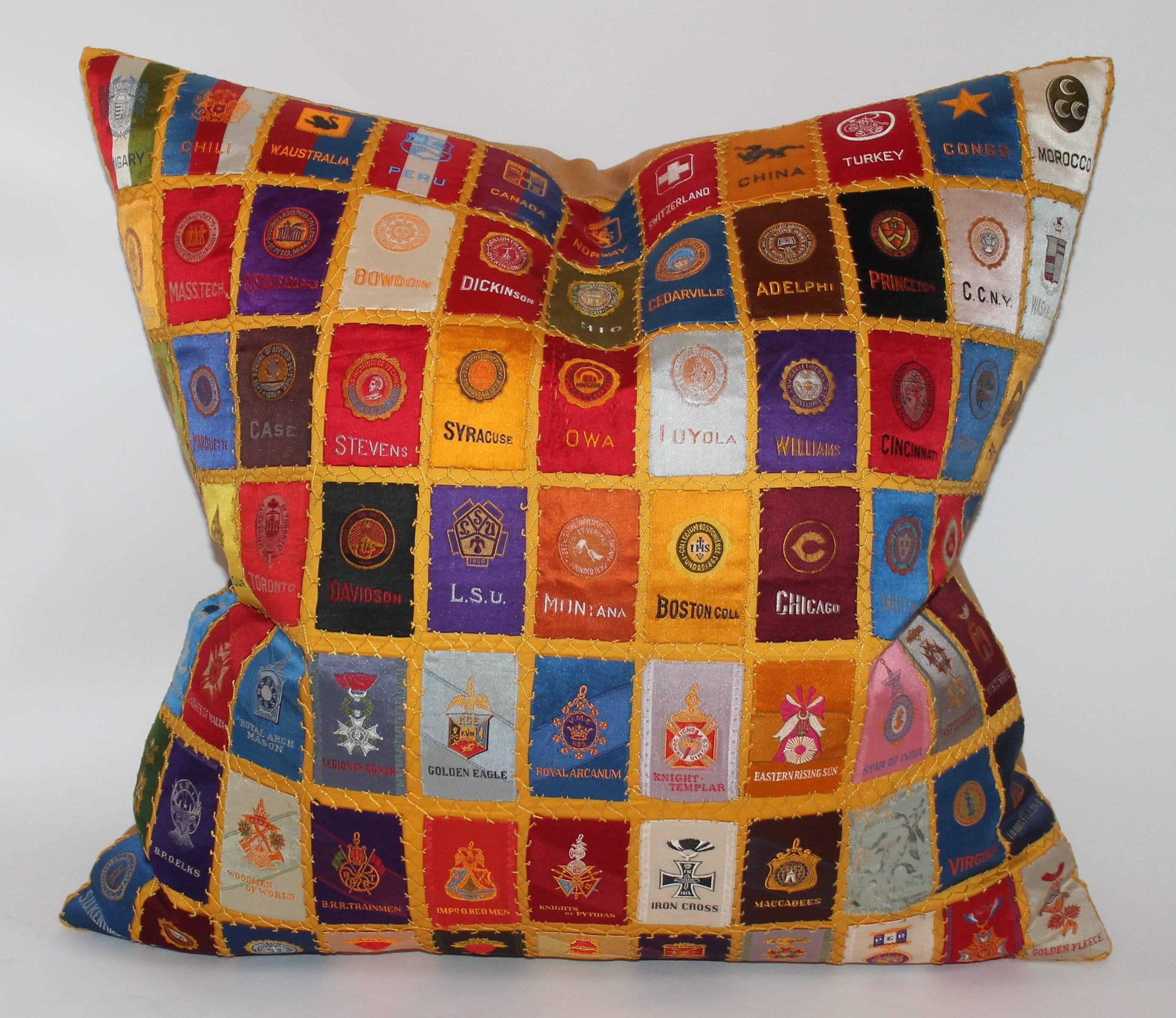 This fine example of a small quilted sham is of colleges and are cigar premiums. The condition is pristine and super rare to find.