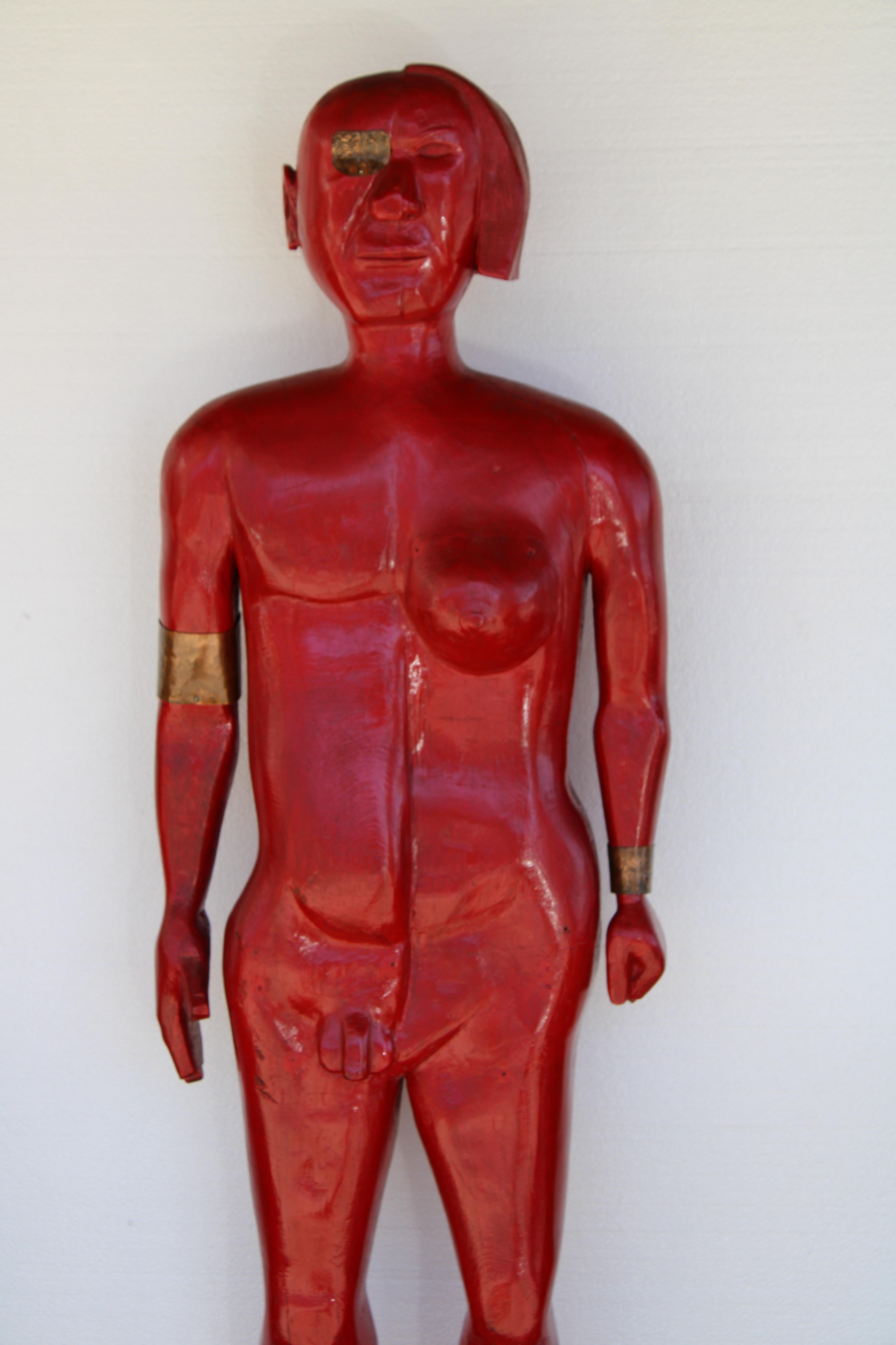 Cigar store red wood statue titled Half and Half,  Pipe Mixture.  Statue is half man and half woman.  Left foot has a carved number of 523.  A great piece of Americana.  Total height is 62