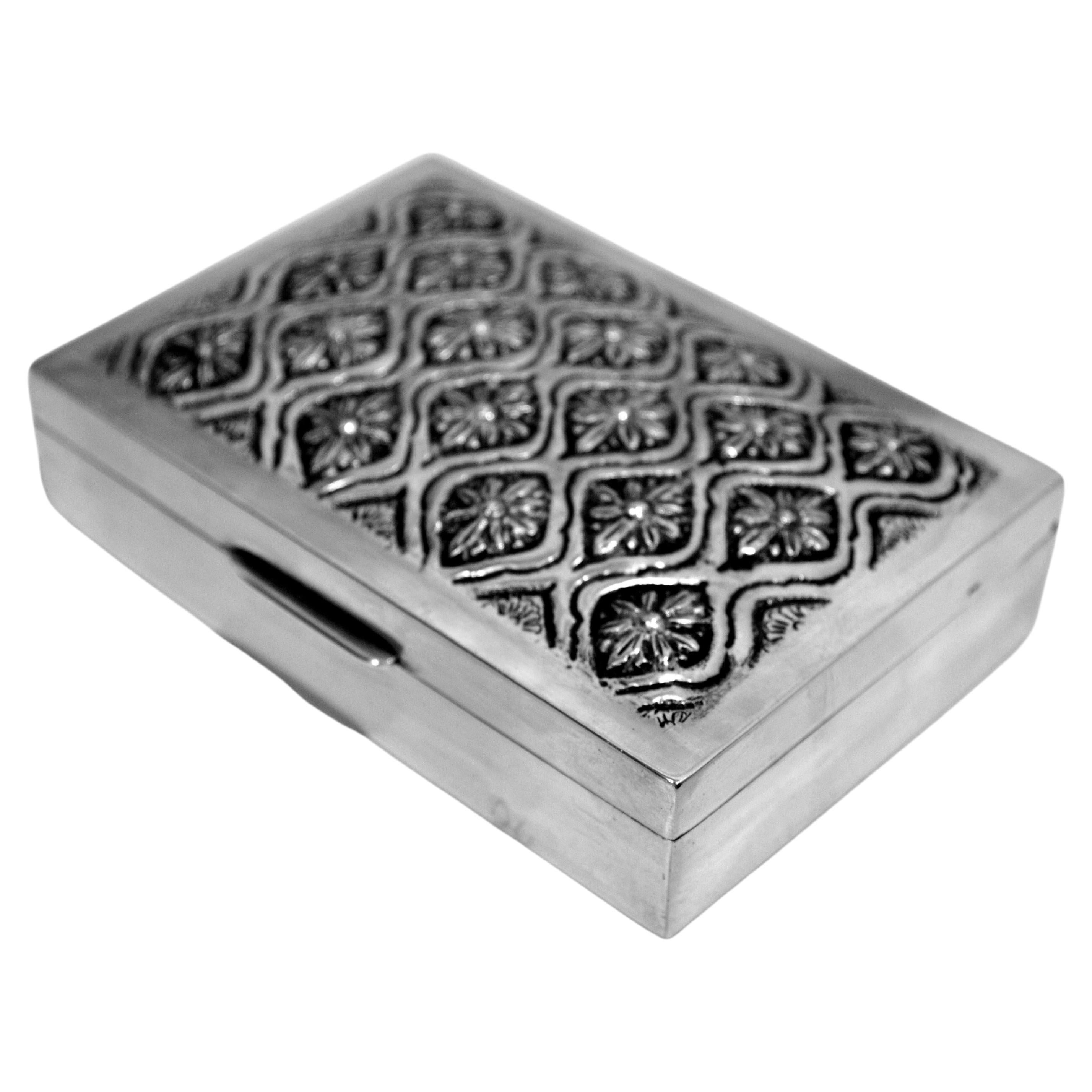 Cigarette Box in Hammered Solid Silver with a Decoration of Stylized Flowers For Sale