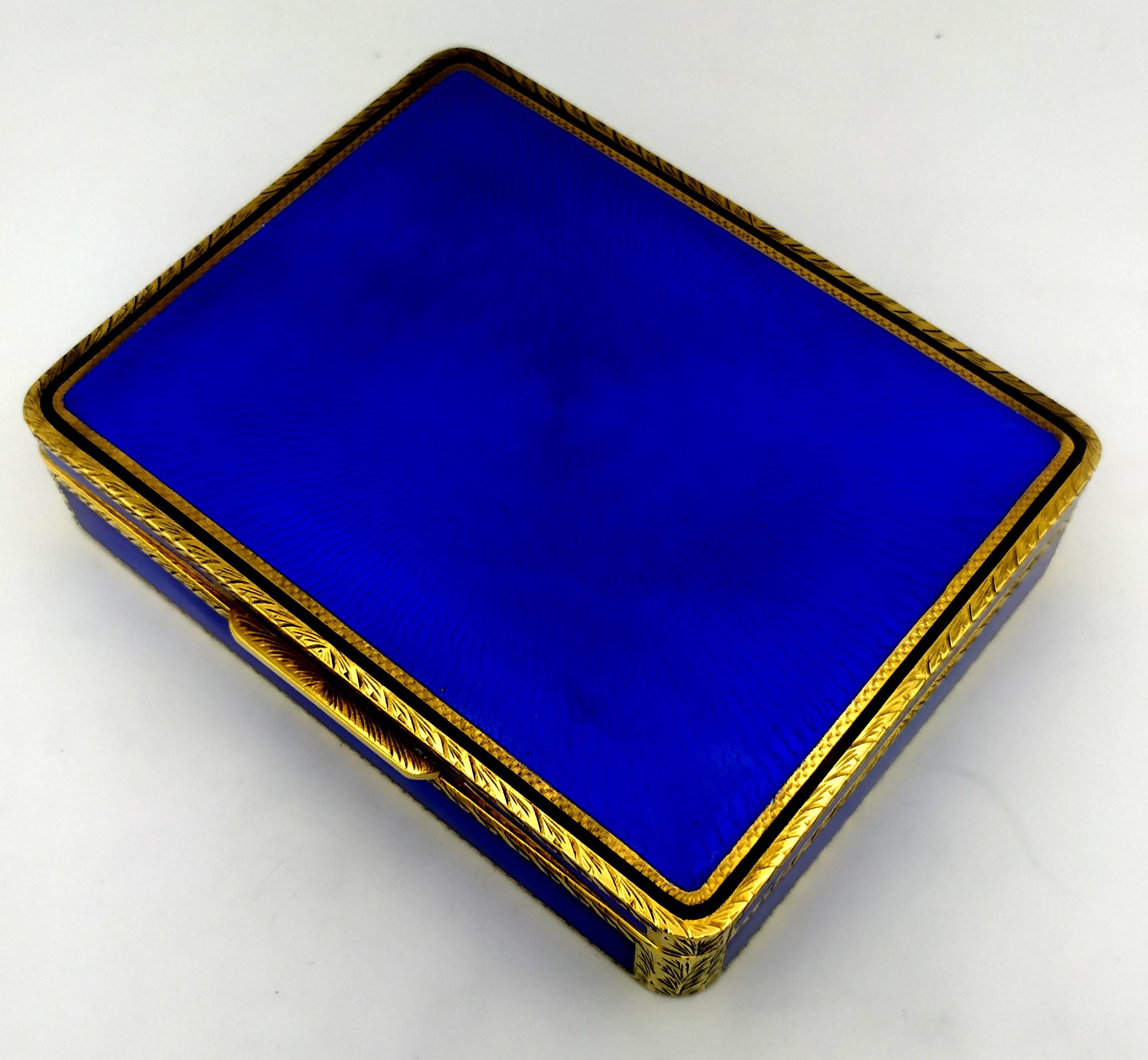 Rectangular with rounded corners table box for cigarettes in 925/1000 sterling silver gold plated with translucent enamels on a radial guilloché and hand-engraved finishes, in a modern contemporary style. Dimensions cm. 10 x 13 x 3. Weight g. 449.