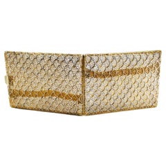 Cigarette case in gilded silver filigree in the shape of scales and a hinged lid