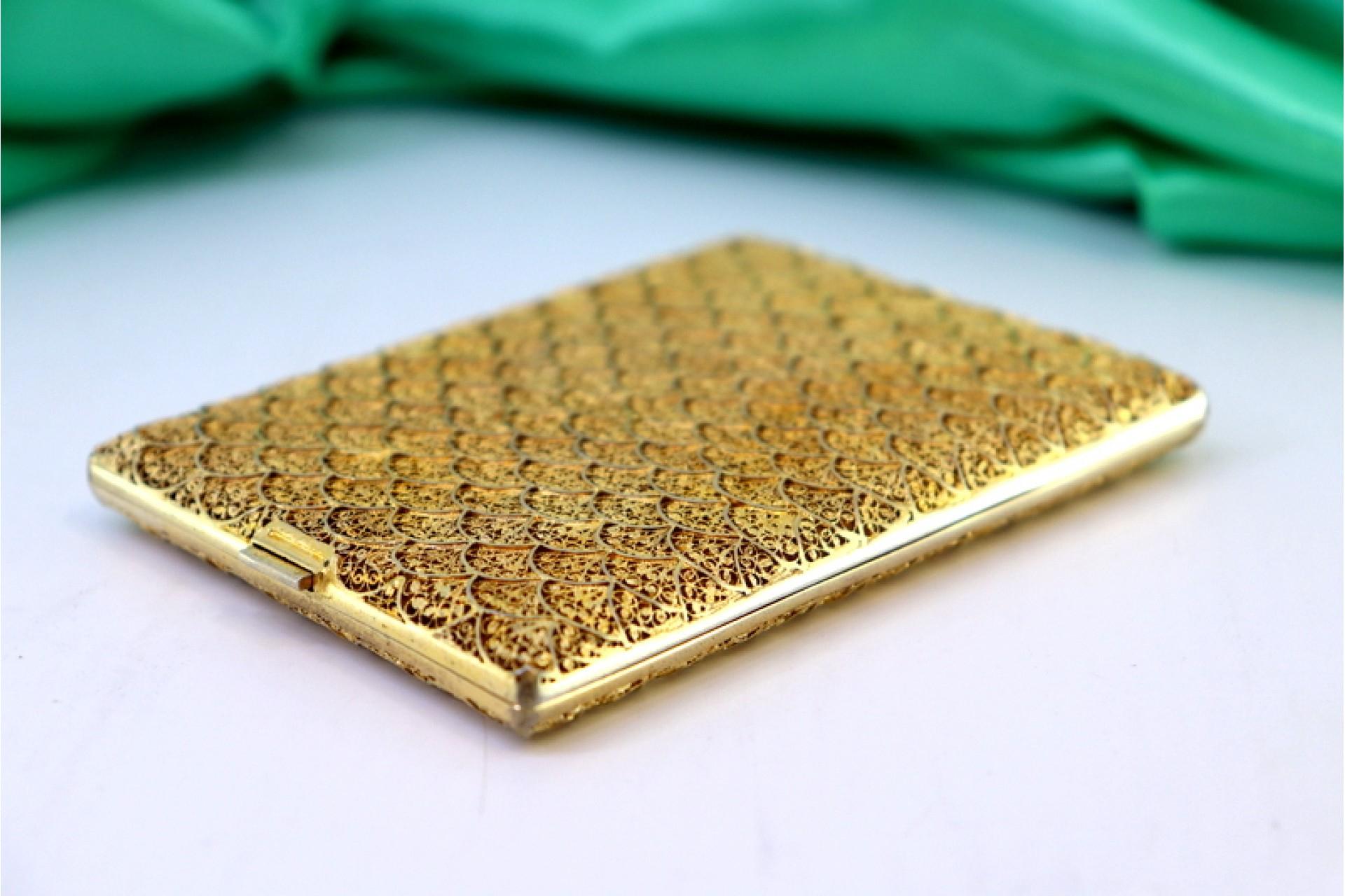 20th Century Cigarette case in silver filigree w/ gold reliefs & two cigarette holders inside For Sale