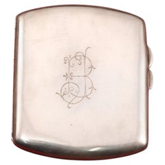 Porta sigarette. Argento e tessuto. W & F Rabone. Birmingham, Inghilterra, 1916.