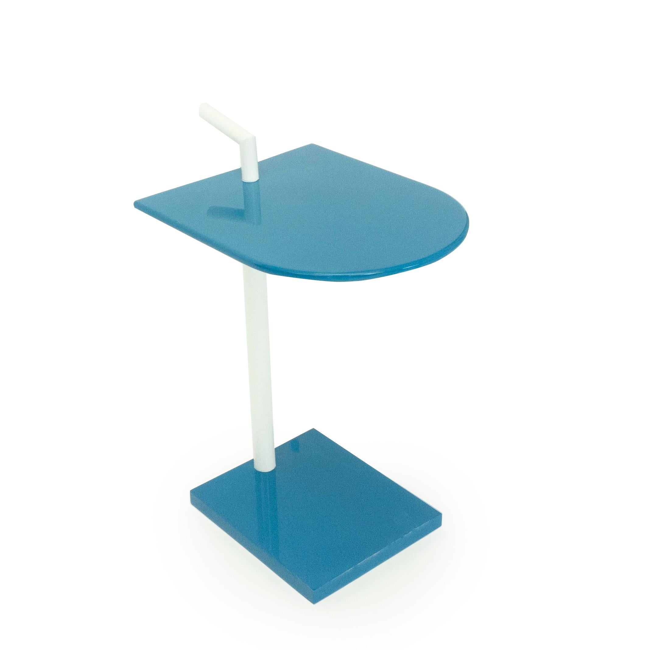 Ultra modern cigarette table designed and manufactured by us in Norwalk CT. Made of wood with a blue and white lacquer finish. Table functions as end table for tight spaces. This table can be lifted with the handle while securing objects on the