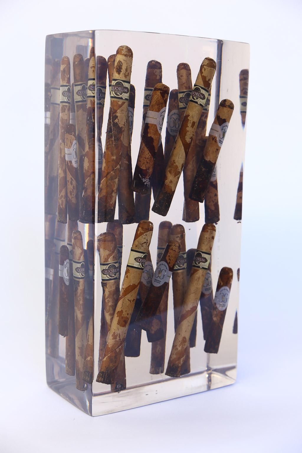 Add that touch of the unexpected with this whimsical art work of cigars emerged in resin. With the free floating illusion of the cigars it is sure to start a conversation if placed in your home or office.