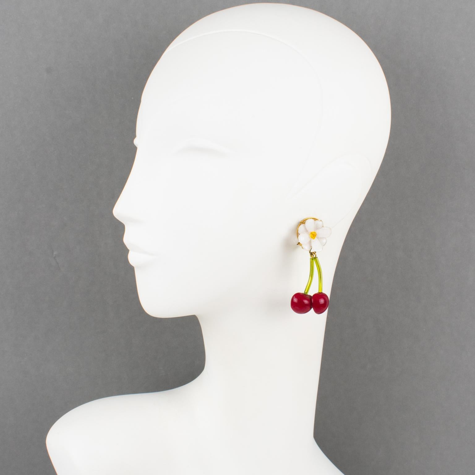 Lovely Cilea Paris resin clip-on earrings. Long dangle shape, featuring dimensional cherries with cherry blossom in assorted tones of bright red, tender green, and white and yellow colors. Engraved underside with the 