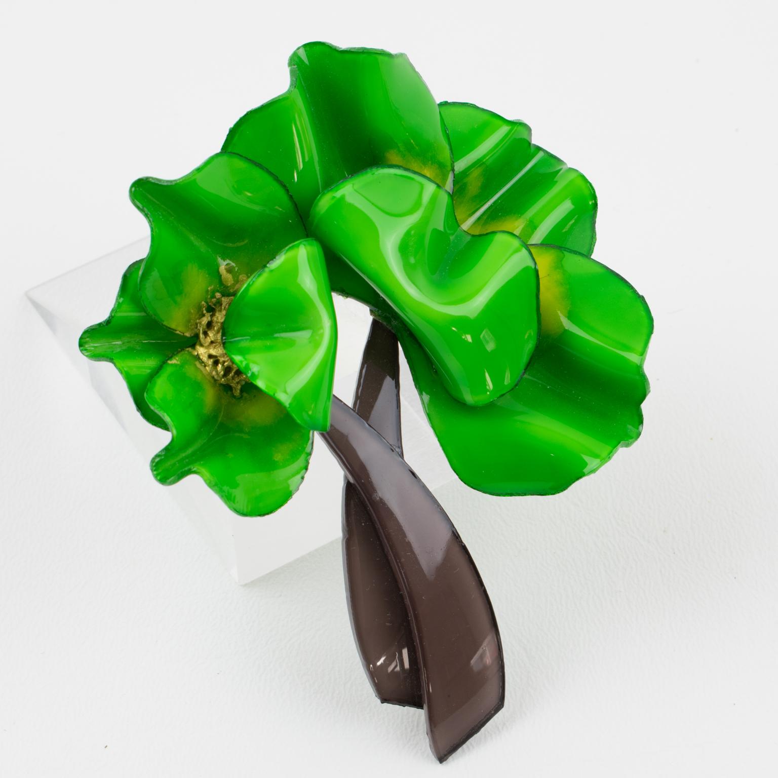 Charming dimensional oversized pin brooch by Cilea Paris. Floral-inspired hand-made artisanal resin pin brooch featuring poppy flowers with textured patterns build together to form a powerful statement piece. Vivid fresh green and taupe brown