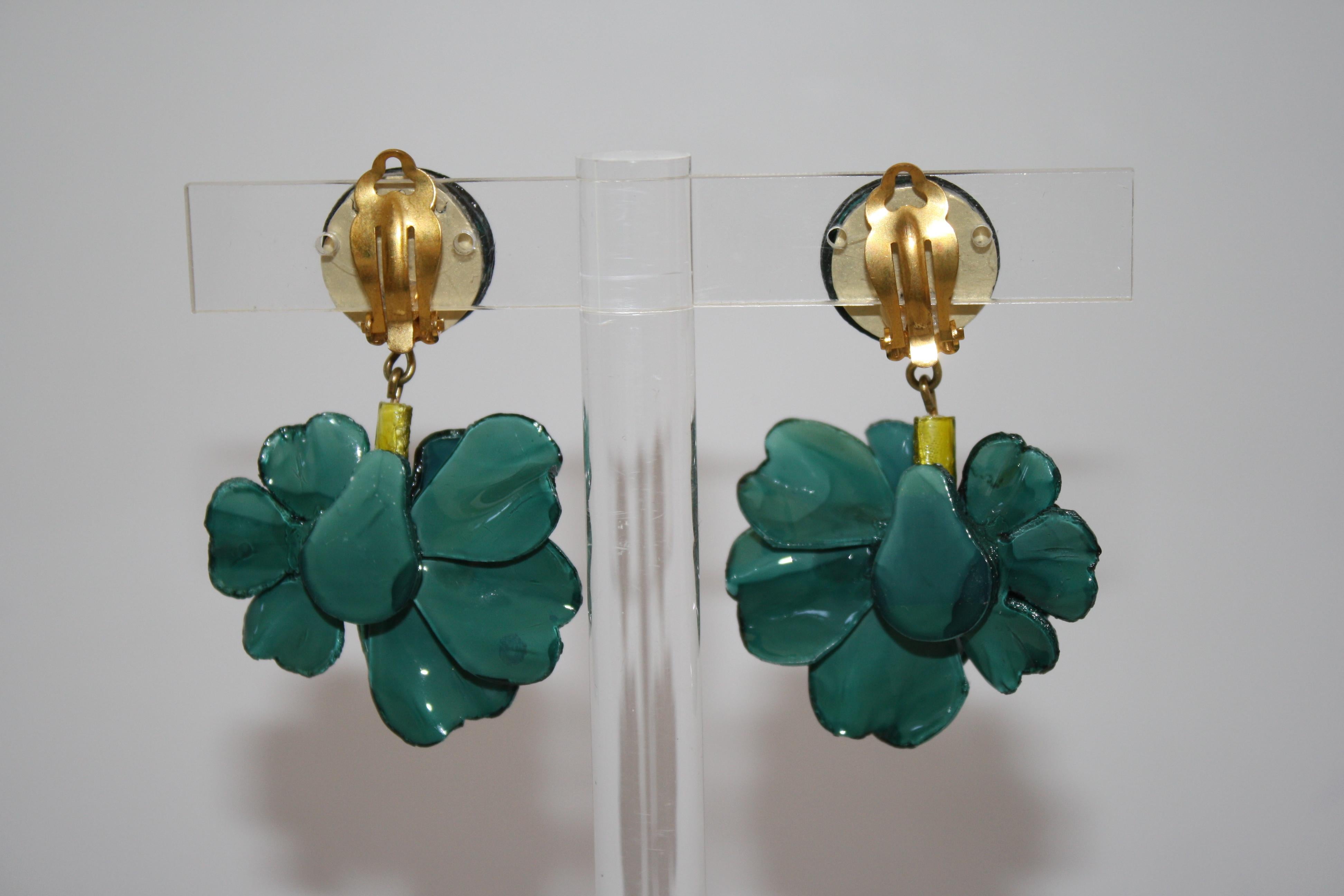 Handmade peacock green resin earrings from Cilea Paris. These earrings add dimension to any look with two flowers side by side on the same ear. Lightweight!