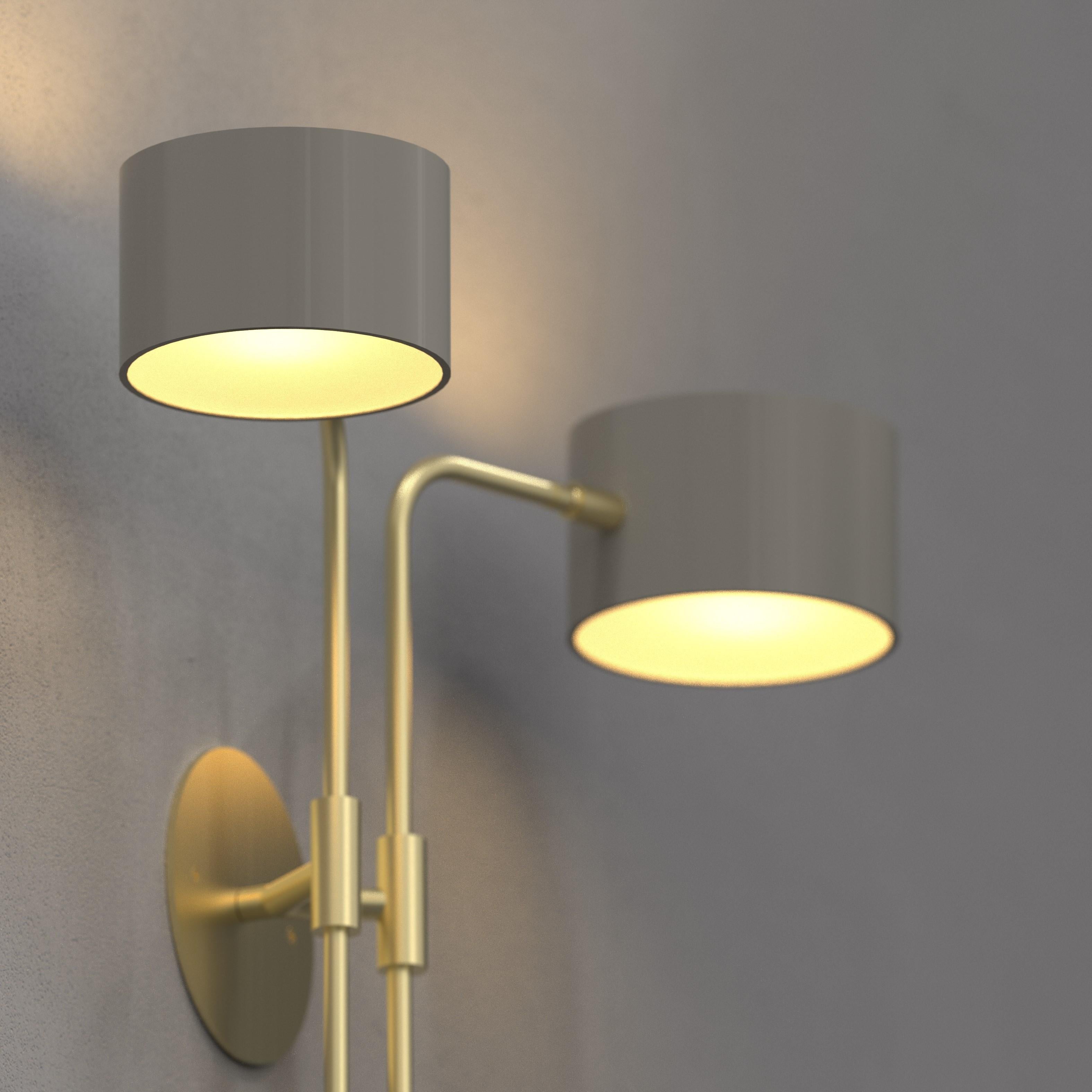 Elevate your ambiance with the Cilindro 2, a sconce that embraces the beauty of well-rounded design. Featuring cylindrical shades evocative of its Italian namesake, Cilindro 2 brings a touch of contemporary elegance to your space.Shade is