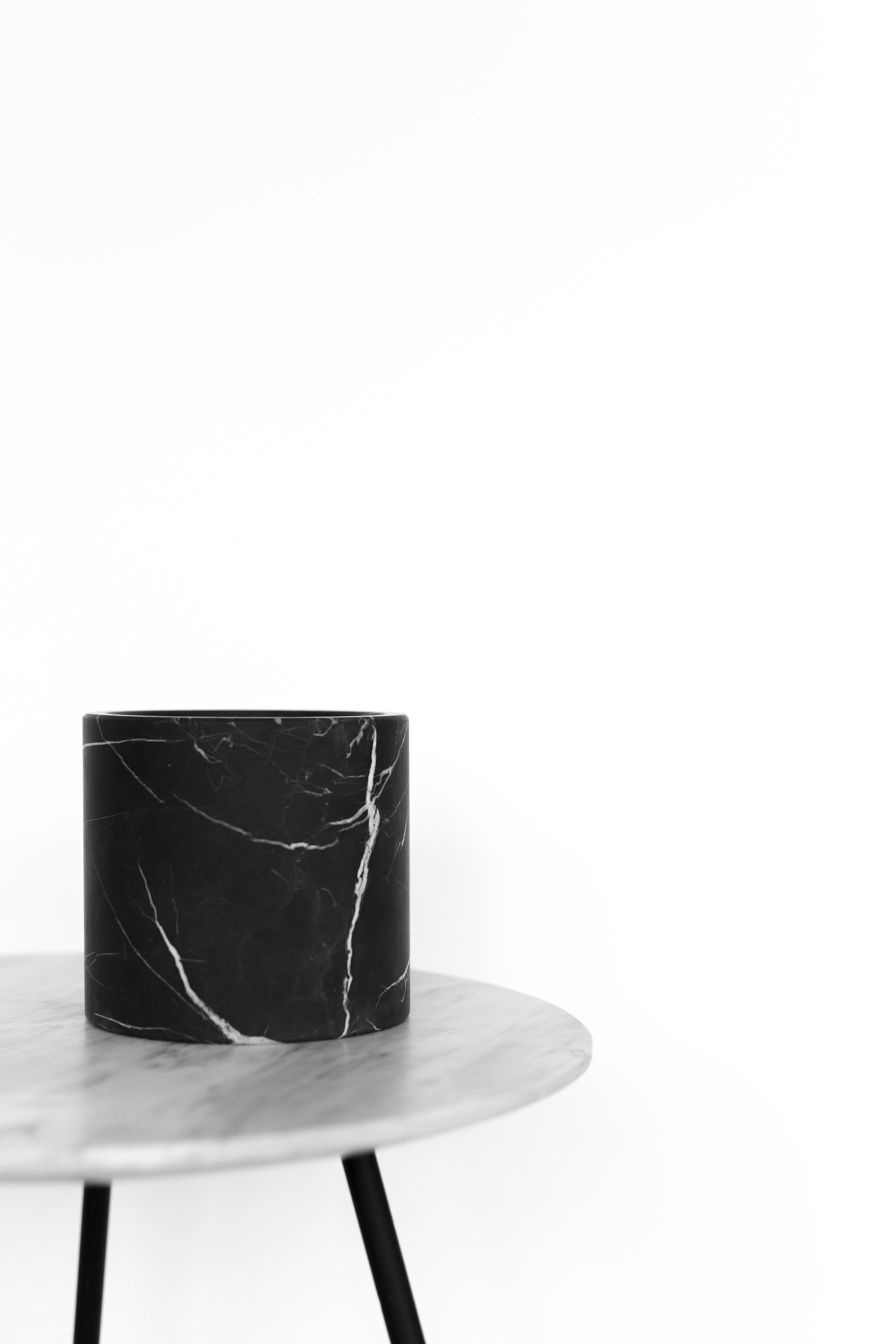 Plantpot in carved Monterrey black marble. Handmade in Mexico.  Production time: 6-8 weeks for items without marble / 13-14 weeks for marble pieces. Shipping +10 additional business days. Casa Quieta uses natural materials such as woods, stones,