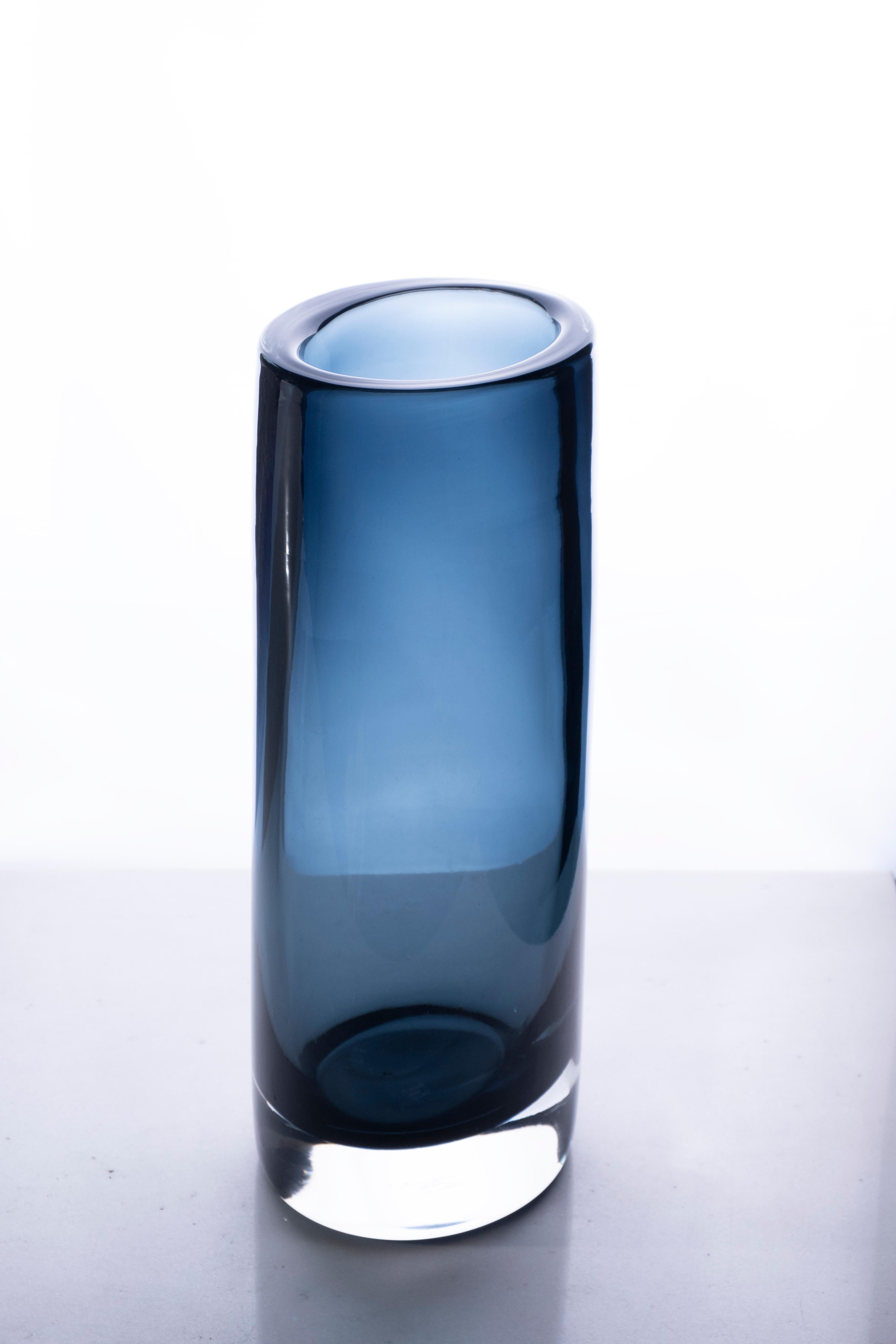 Cilindro large vase by Purho
Dimensions: D 14 x W 12 x H 40 cm
Materials: Glass
Other colors available.

Purho is a new protagonist of made in Italy design , a work of synthesis, a research that has lasted for years, an Italian soul and an