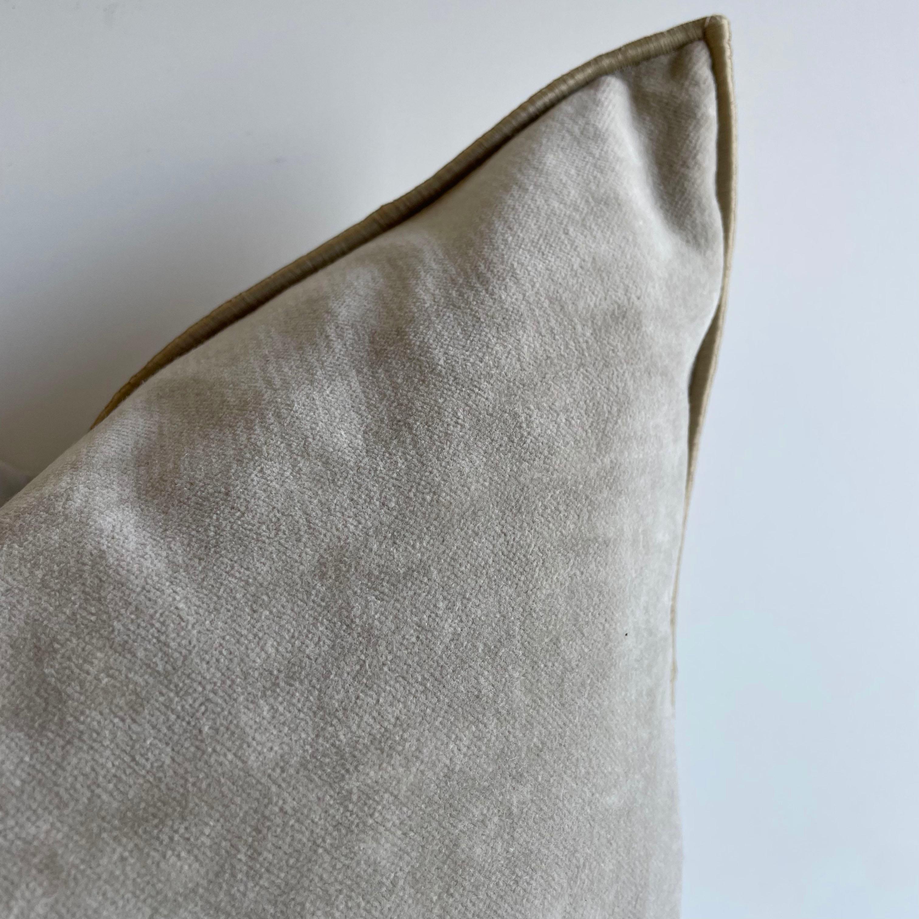 Beautiful French soft grey velvet pillow with binded edge. Metal zipper closure, and leather pull. Custom made in Paris, France. Includes down feather insert. 

Size: 20