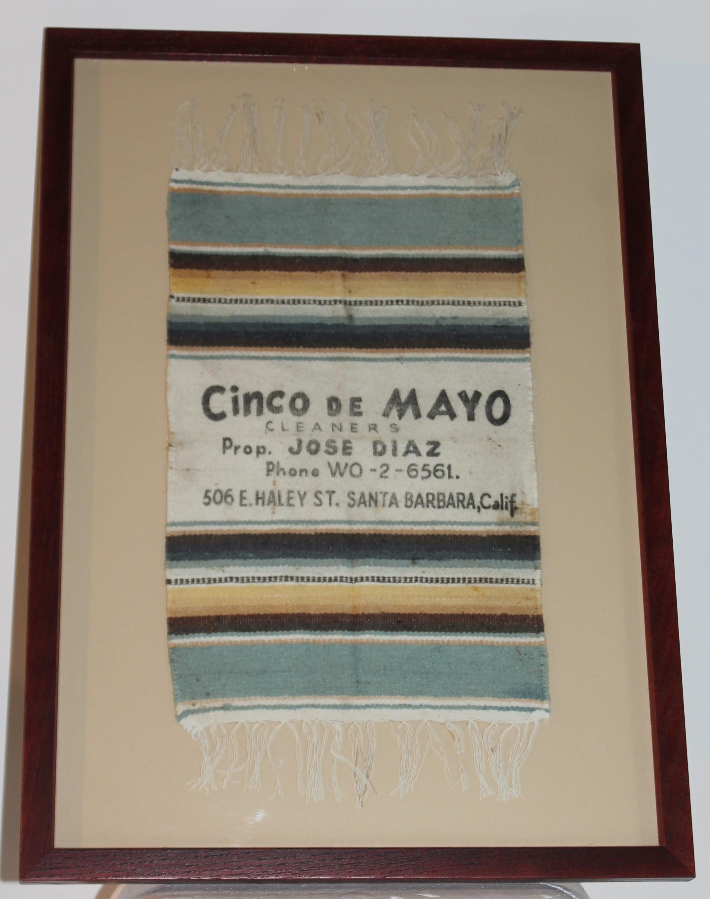 This most unusual framed Serape / printed advertisement is most unusual . It is stamped 
