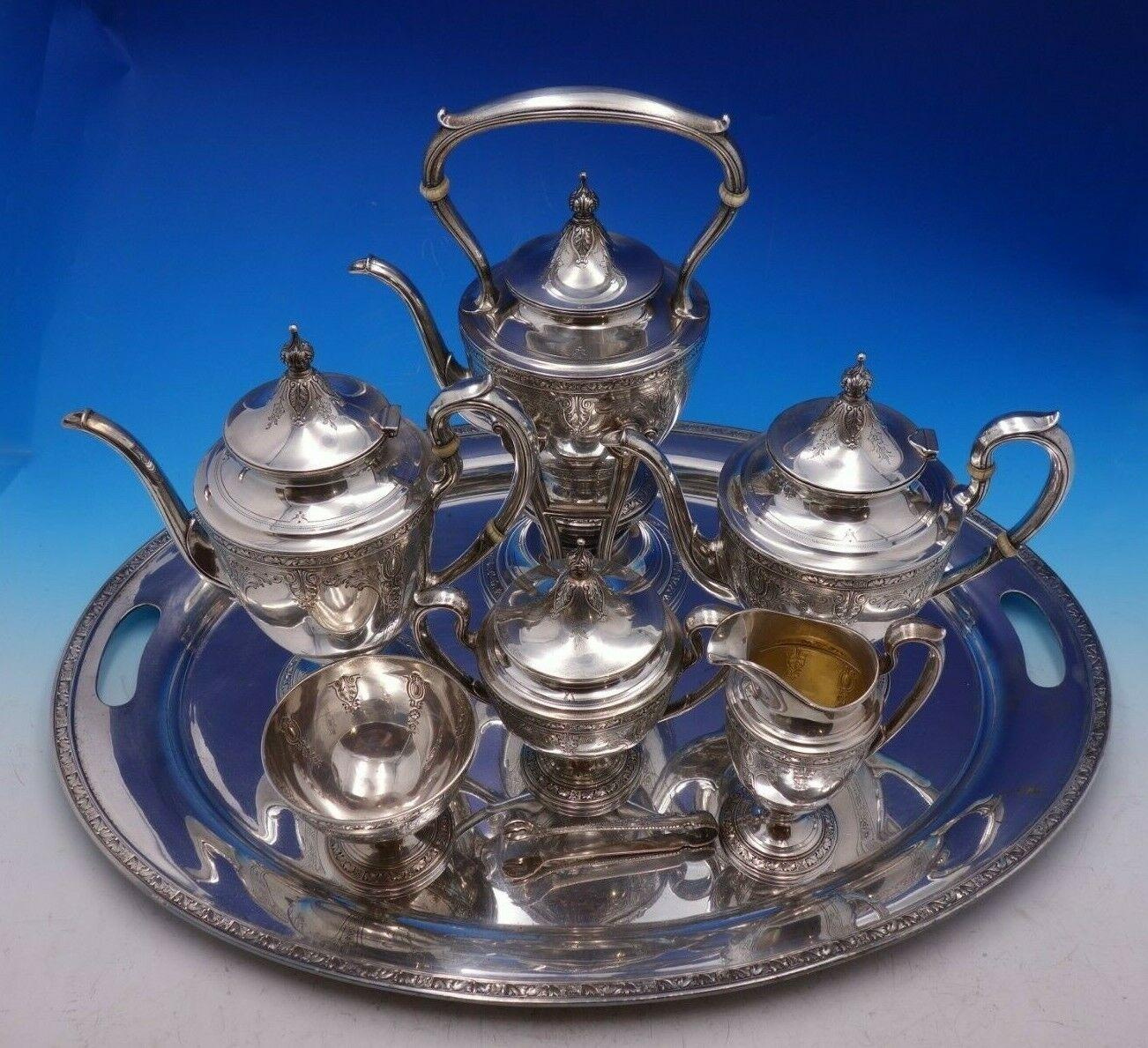 Cinderella by Gorham

Beautiful Cinderella by Gorham sterling silver seven piece tea set with silver plate tray. This set includes:

1 - Kettle on stand: Marked #20206, measures 13 1/2