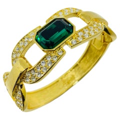 CINDY ADAMS signed vintage gold emerald green glass designer clamper bracelet