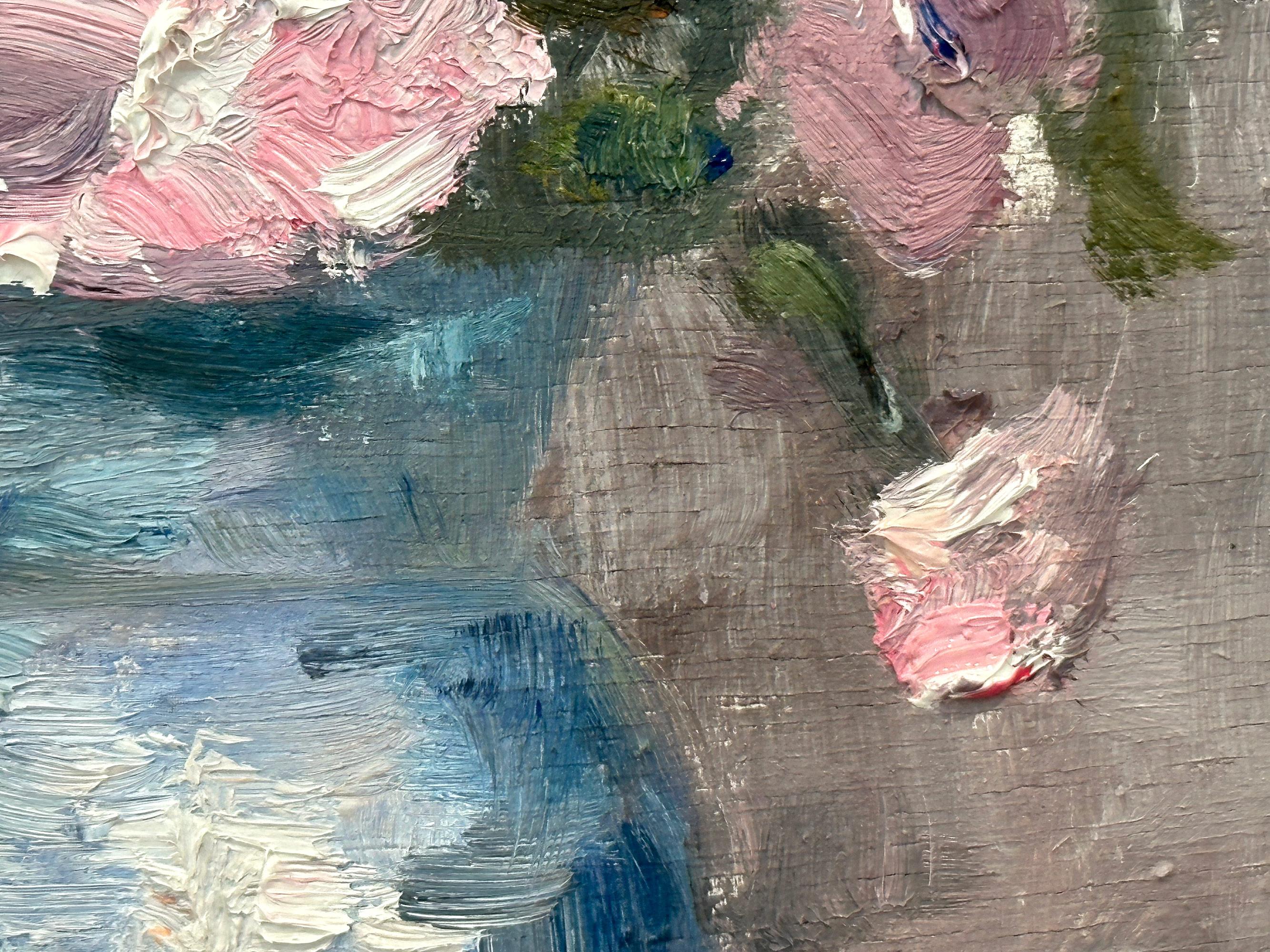 This painting depicts an impressionistic scene of Peonies in a Blue Vase, a poetic piece with beautiful details. The work reminds us of Claude Monet, with impressions similarly captured, reminiscent of times of the early 20th Century similarly to