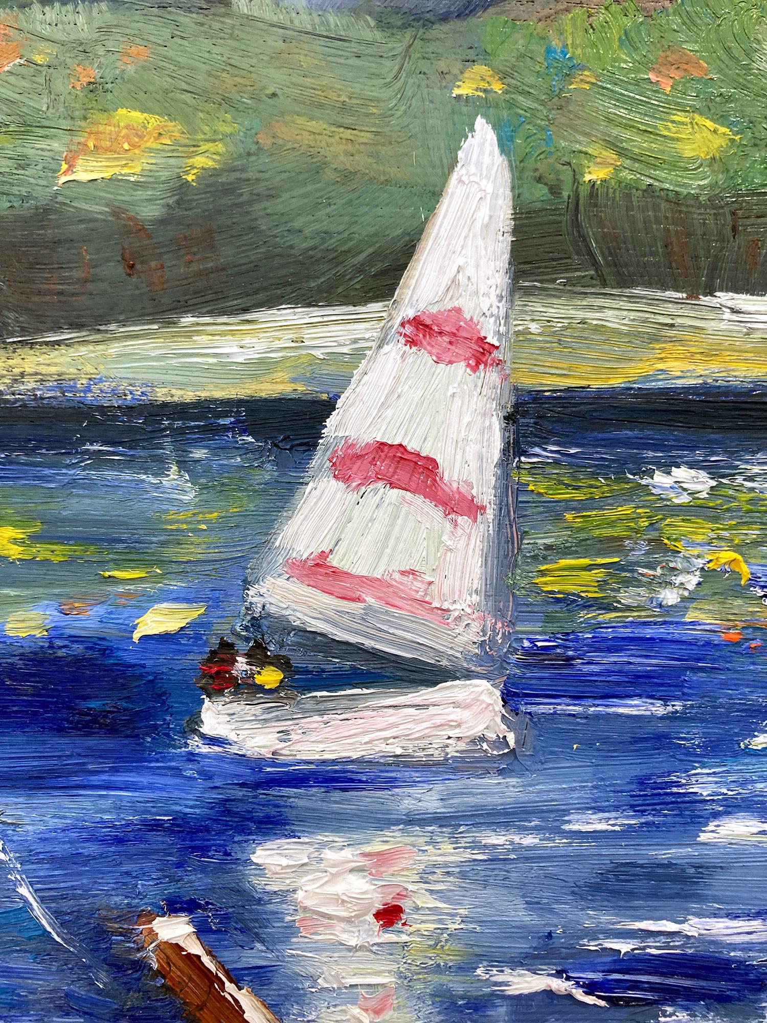 This painting depicts an impressionistic scene at the lake with beautiful brushwork and whimsical colors. There are figures by the water, a man fishing and a rowing boat. We can see whimsical sailboats in the distance, with the fall colors