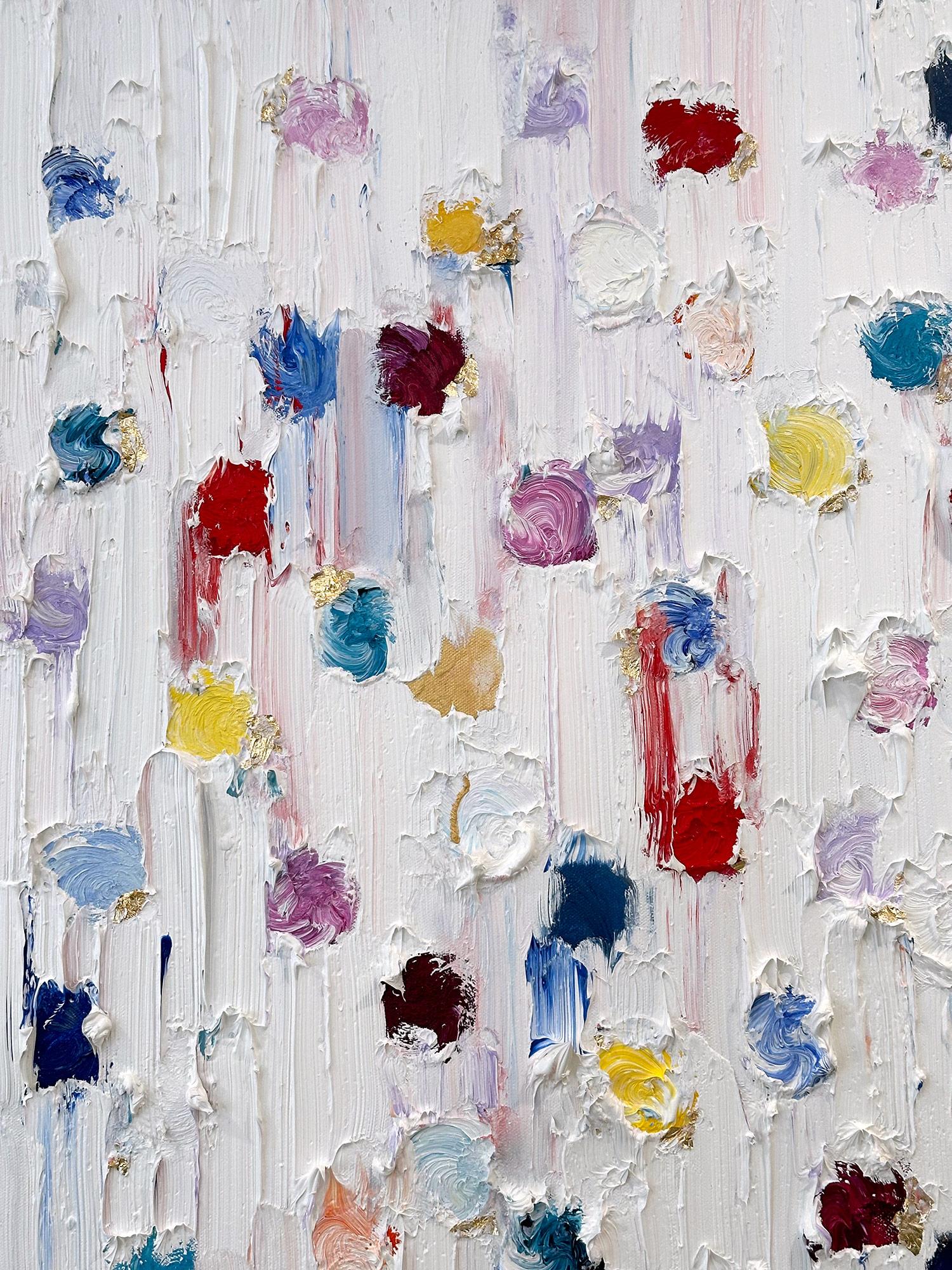 With layers of bright oils and whisking brush strokes, the paint is able to shine and shimmer in a very unique pattern. The artist uses gold flakes with thick textured oils and glass to add a very contemporary, urban feel. The “Dripping Dots”