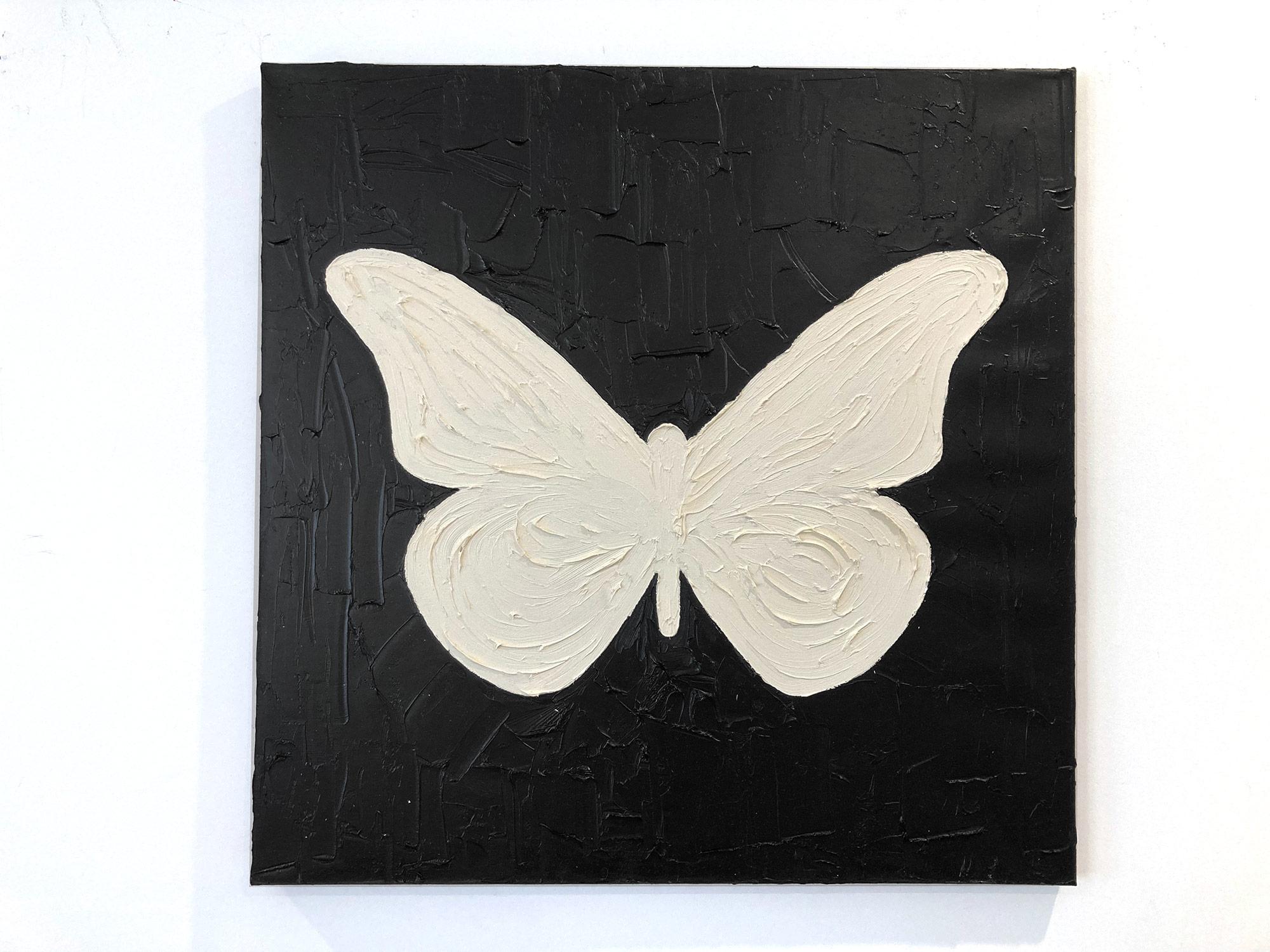 white butterfly painting