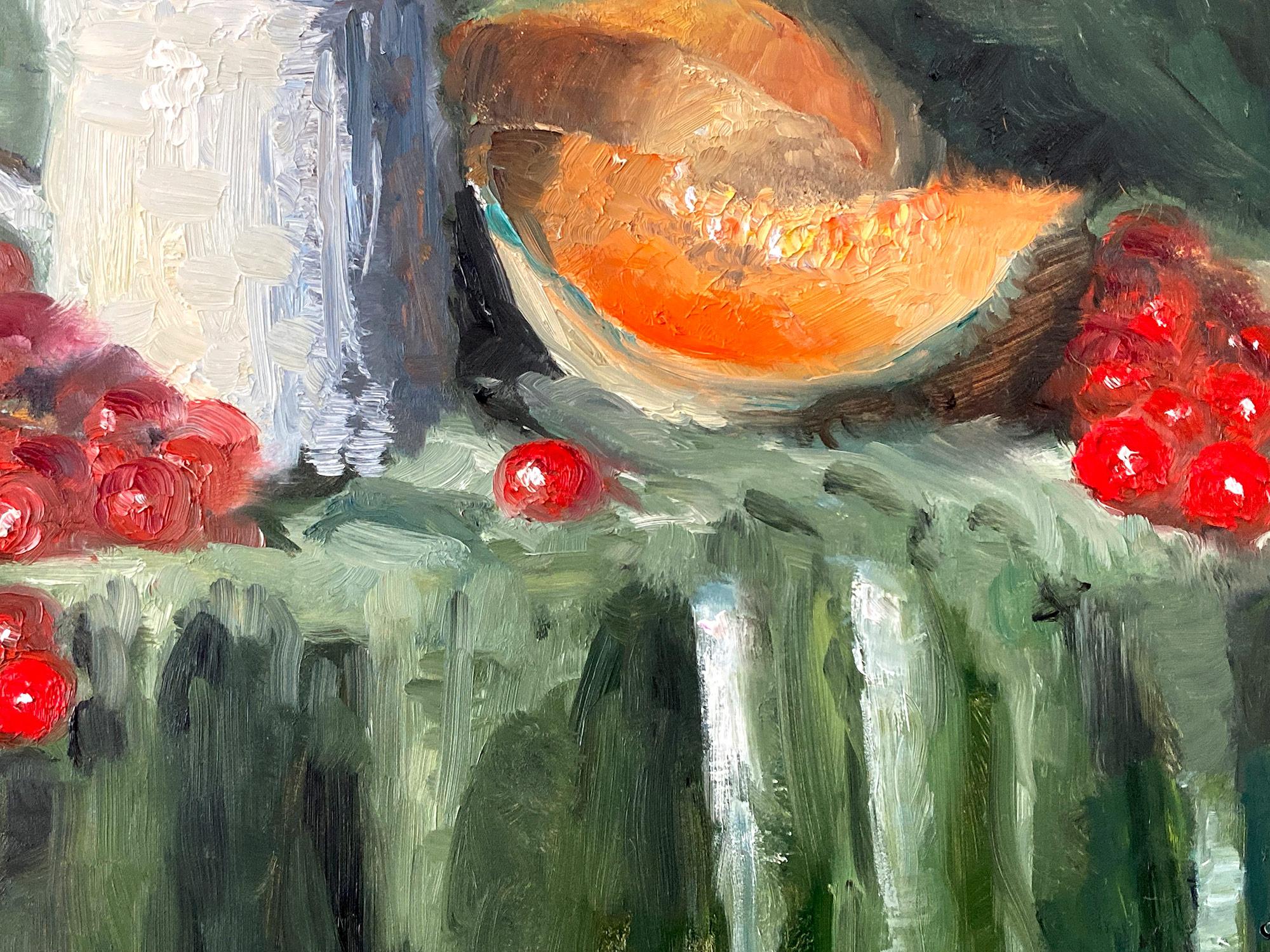 An oil on board, still life of Water Jug with Grapes in Cantaloup in the artist studio. We are focused on the simplicity of beauty at the moment as Shaoul creates a translucent but very colorful pallet with thick use of paint, evoking a result which