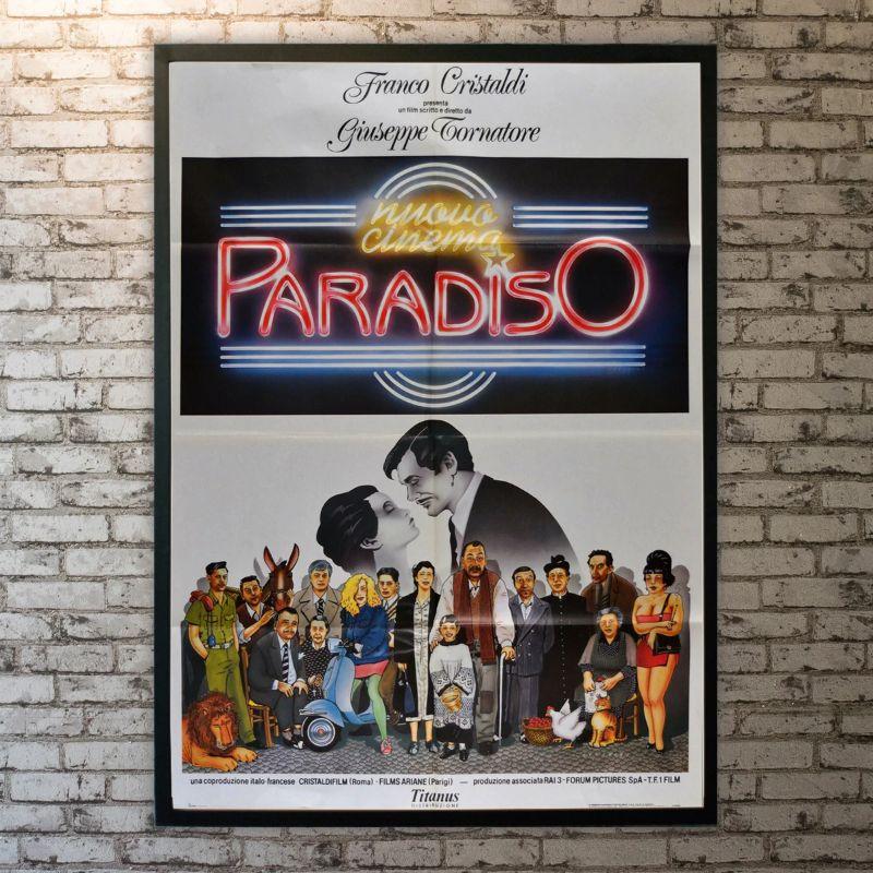 Cinema Paradiso, Unframed Poster, 1988

Original 2 FOGLIO (39 X 55 Inches). A filmmaker recalls his childhood when falling in love with the pictures at the cinema of his home village and forms a deep friendship with the cinema's