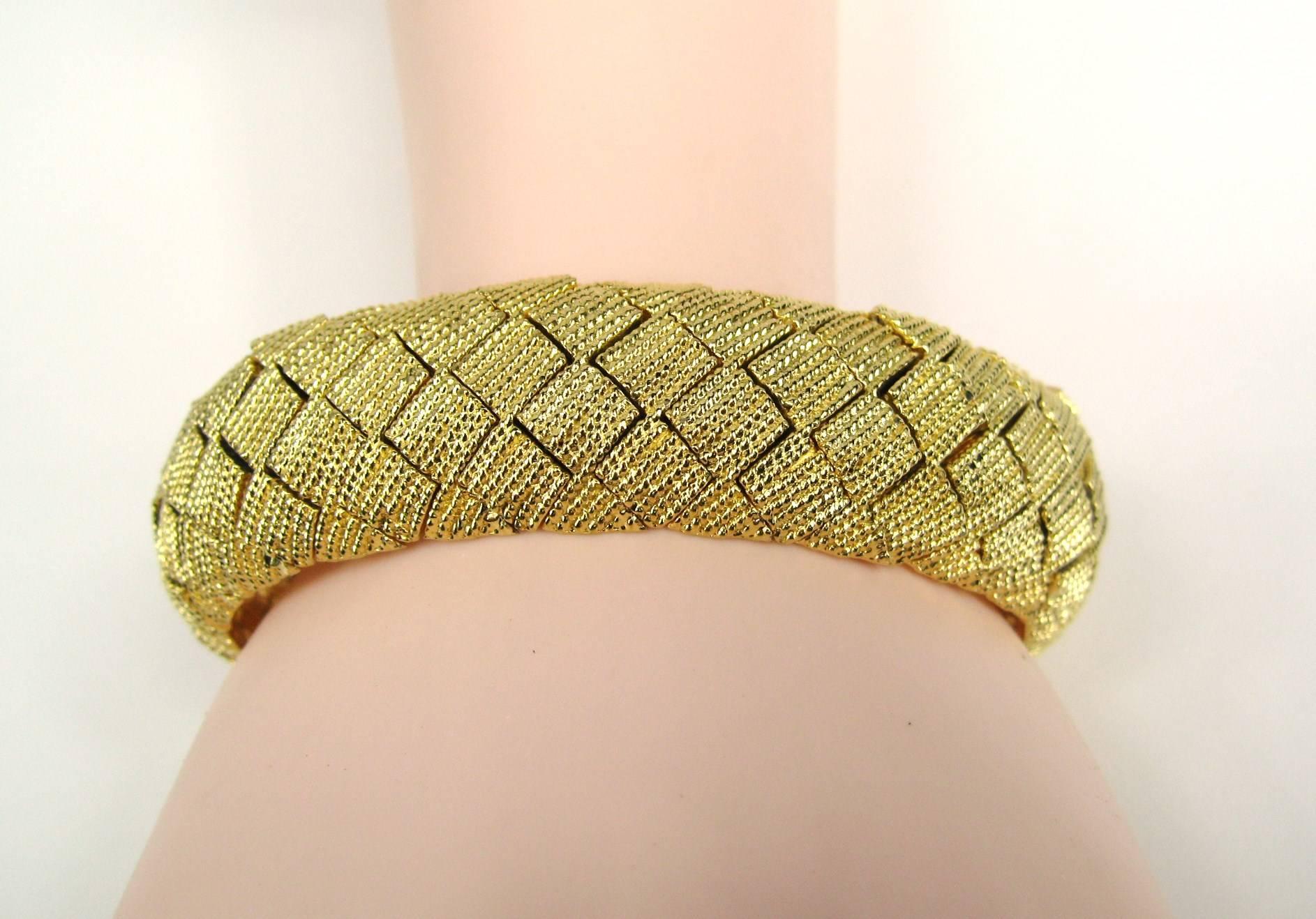 1990s Ciner Bracelet. Measuring .83 inches wide x 7.25 inches long. It will fit a 6.5 - 7 inch wrist nicely.  We have many more Ciner pieces on our storefront. This is out of a massive collection of Contemporary designer clothing as well as Hopi,