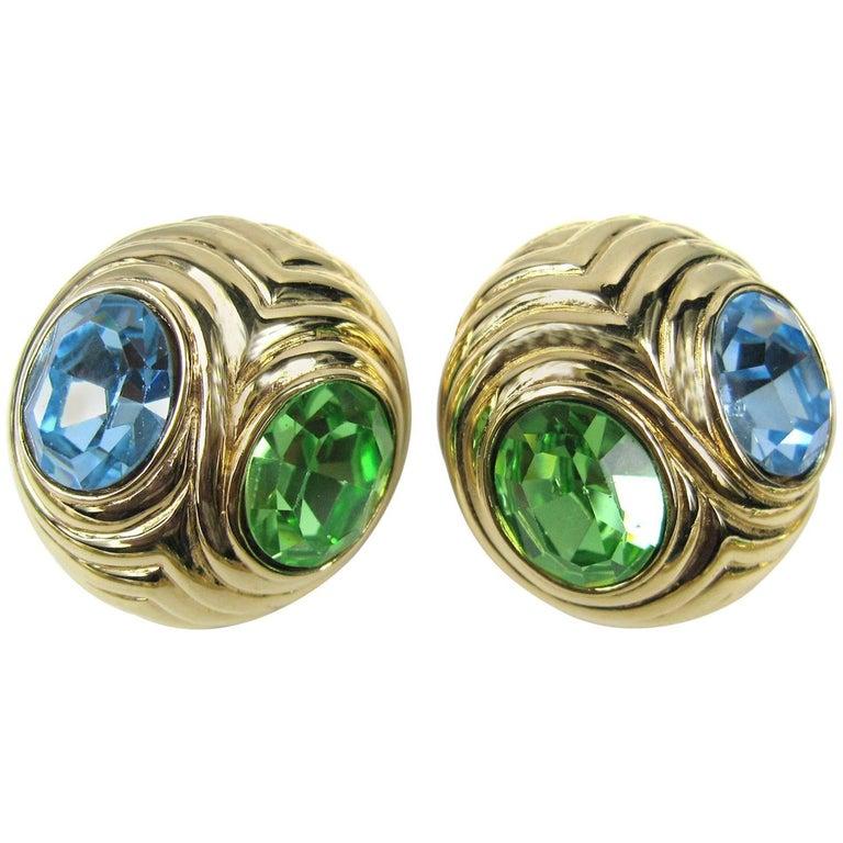 green swarovski earrings