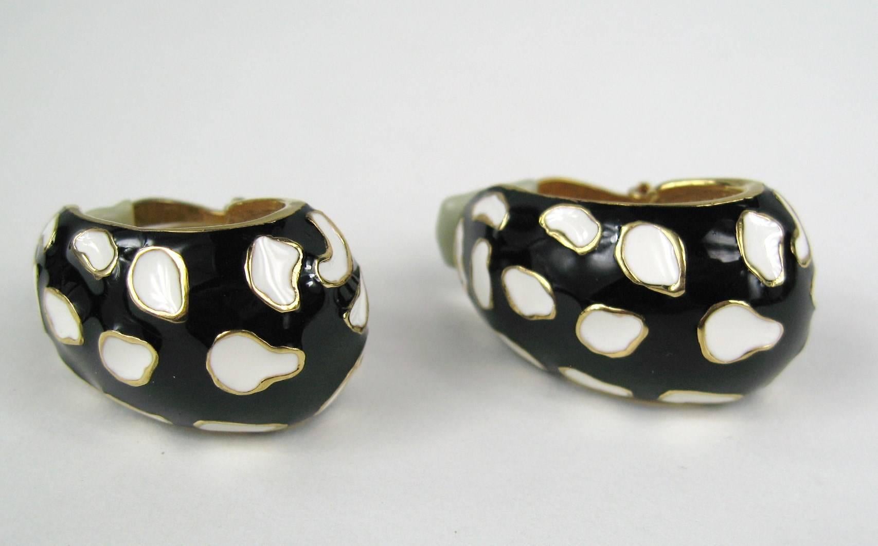 Ciner Black & White with gold tone detailing clip on earrings that measure 1.23 inches  x .78 inches wide. The matching bracelet is on our storefront as well. We have matching sets up on our storefront of many designer jewelry. This is out of a