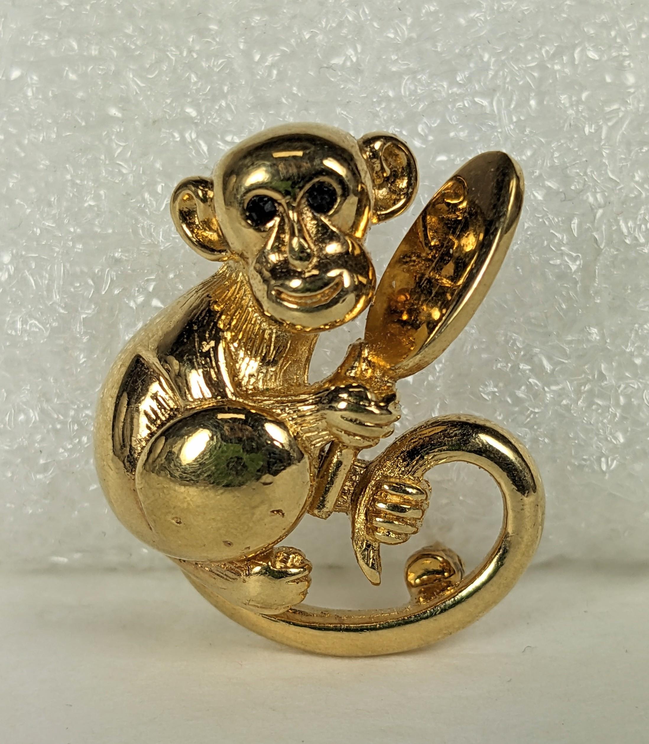 Charming Ciner Gilt Monkey with Mirror Brooch from the 1990's. Jet paste eyes. 1