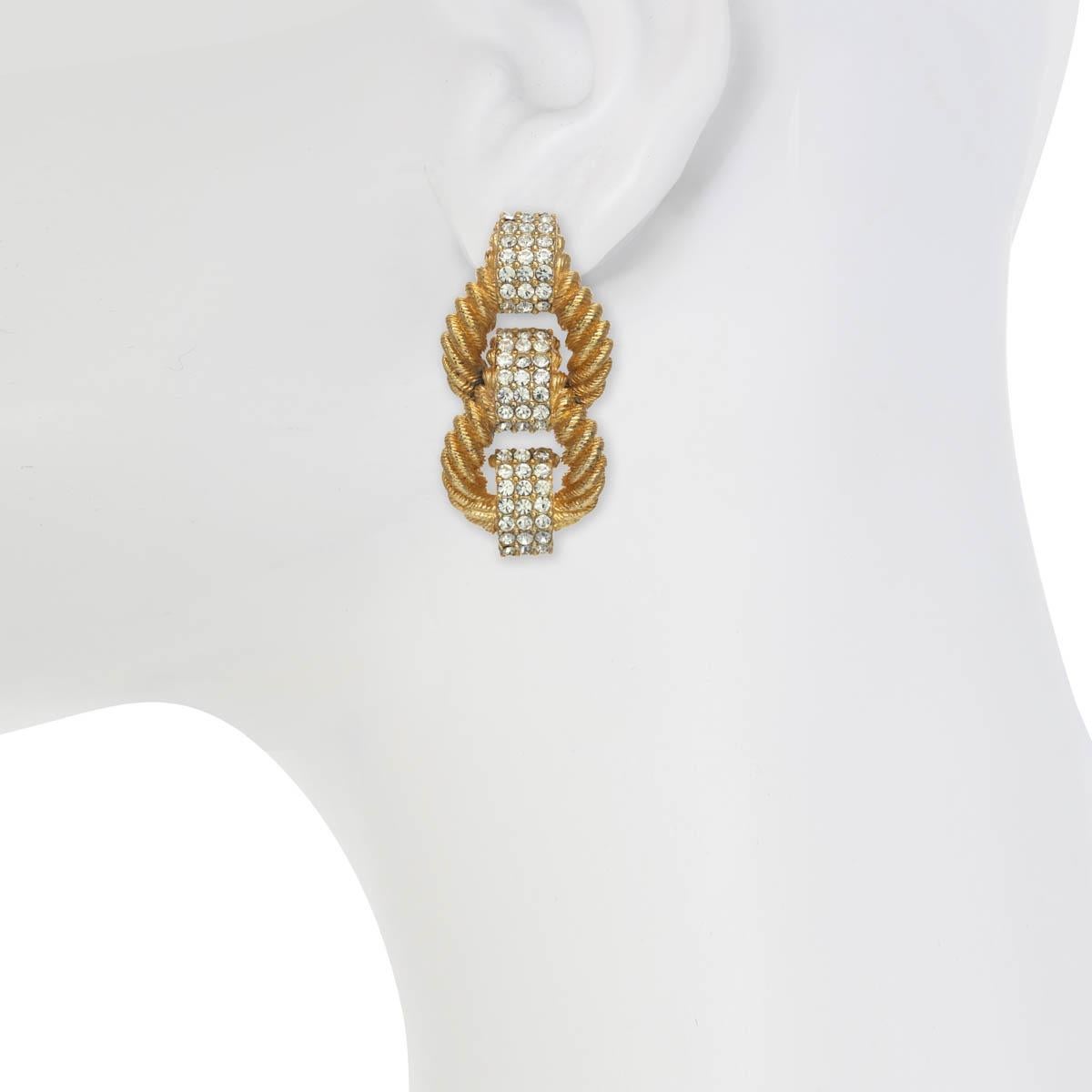 With gorgeous crystal rhinestone accents, these earrings are a timeless staple for every woman's wardrobe. Forever chic, these statement earrings will last the test of time. 

PLEASE NOTE: The pieces available are not vintage and are not