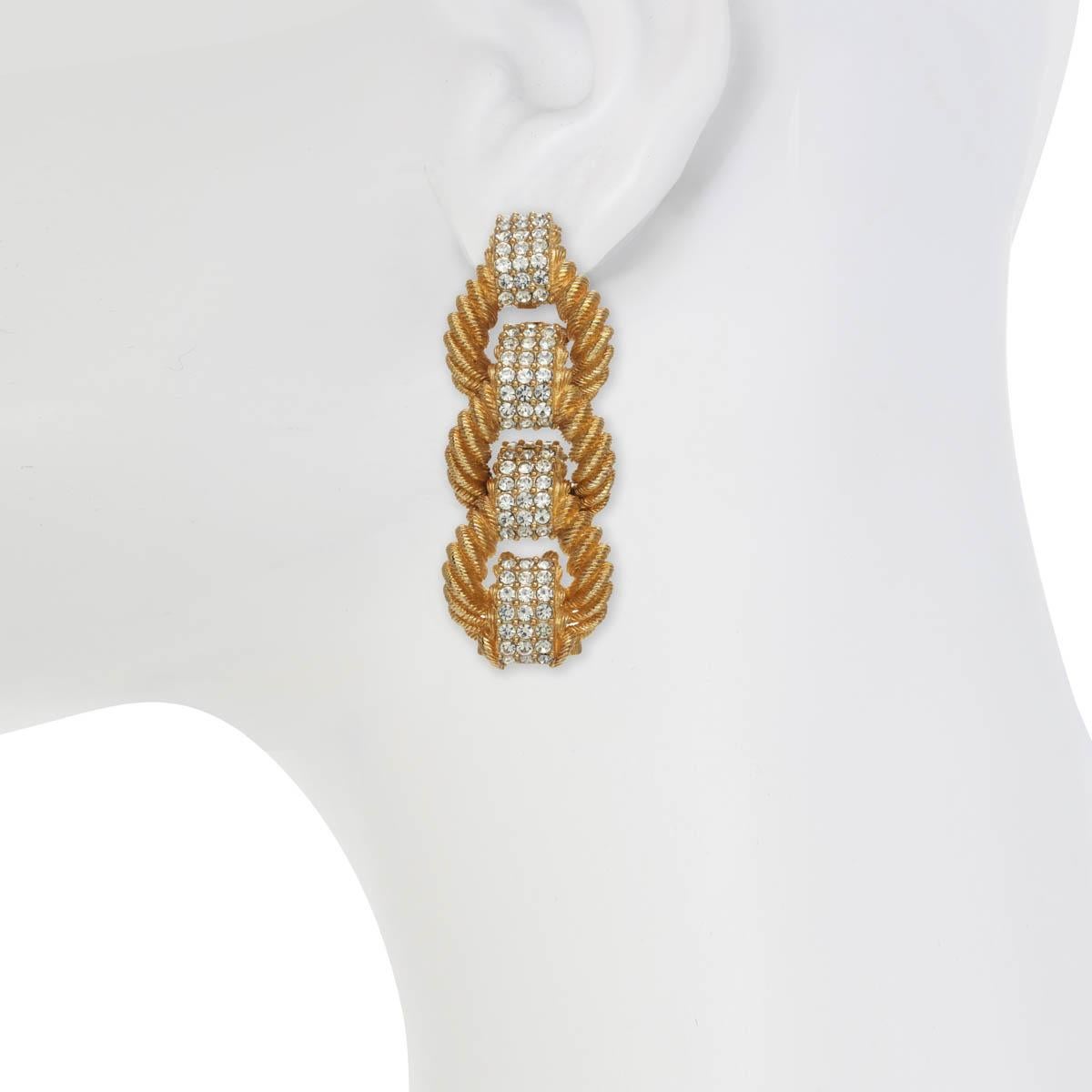 With gorgeous crystal rhinestone accents, these earrings are a timeless staple for every woman's wardrobe. Forever chic, these extravagant statement earrings will last the test of time. 

PLEASE NOTE: The pieces available are not vintage and are not