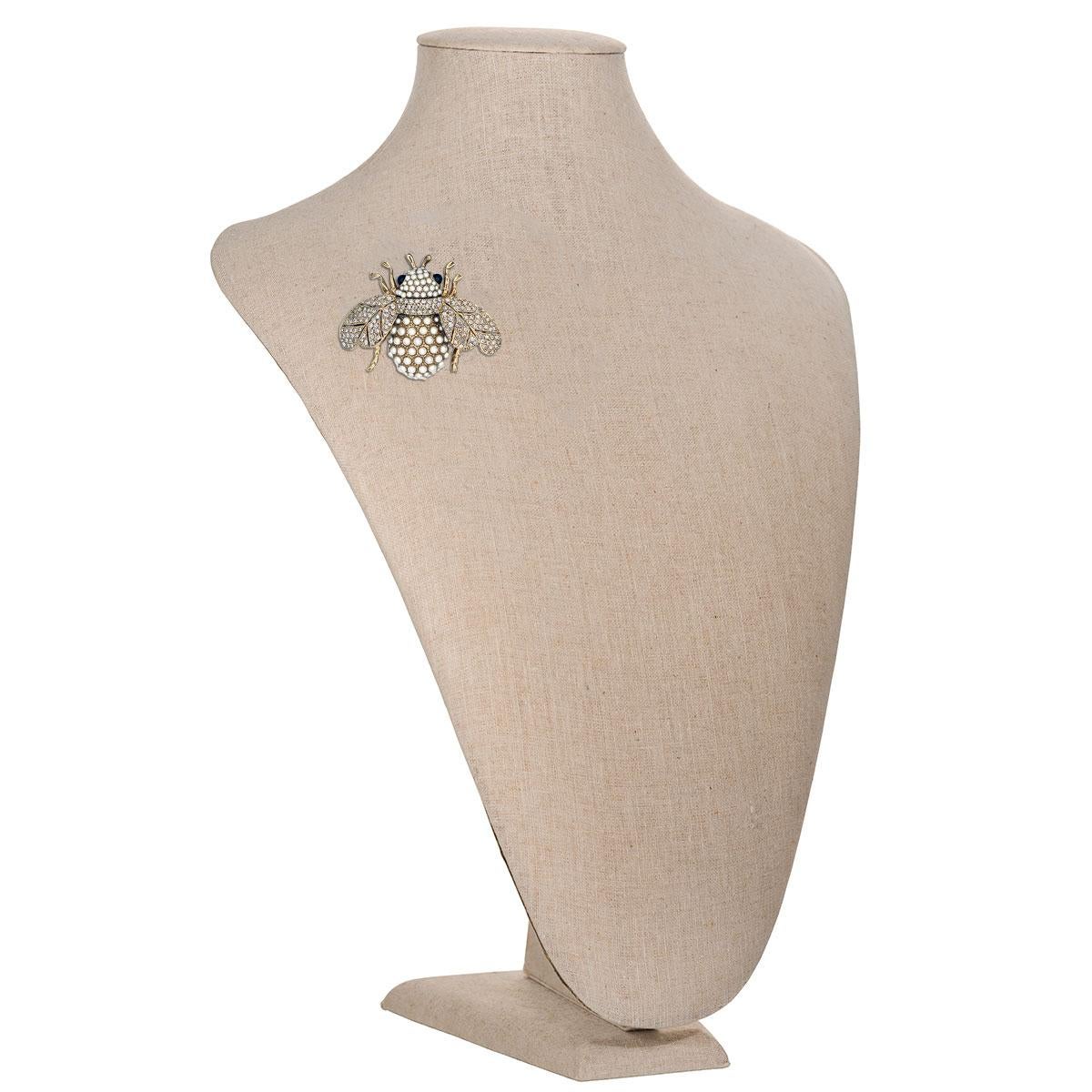 The most gorgeous bee you've ever seen, the Mighty Bee Pearl Pin has illuminating rhinestone and pearl accents for a fun and flirty summer look.

Materials: 
Pewter 
18K Gold Plating 
Crystal Velvet Rhinestones 
Pearl Balls 
Jet Rhinestones