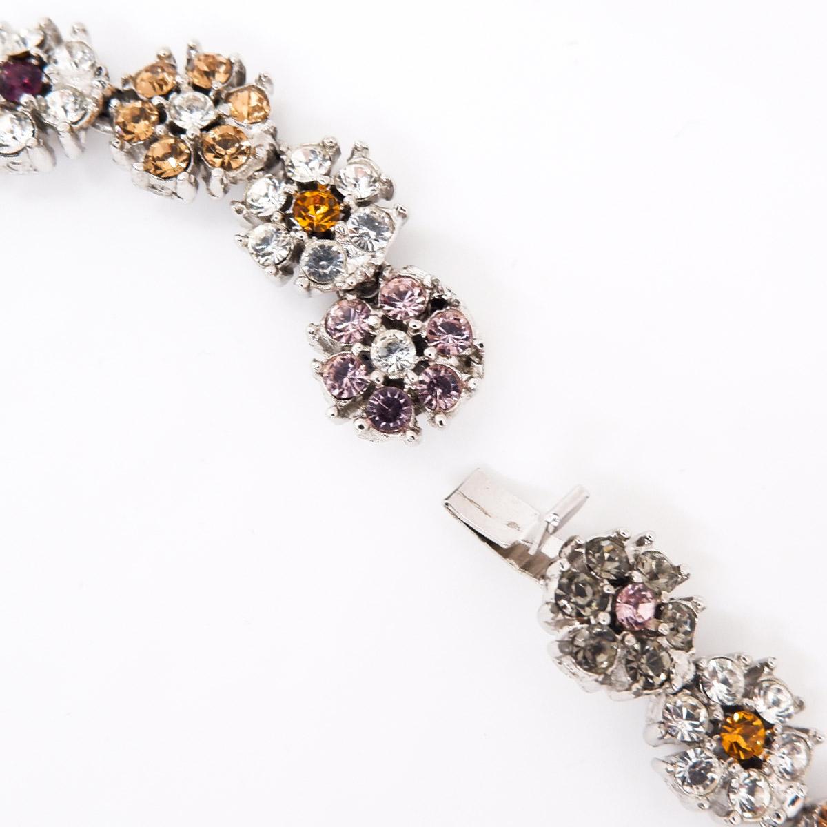 **CINER is a made-to-order house, please allow 10 business days for our artisans to create your jewelry for you** 

A sweet yet sophisticated piece, this stunning multi-rhinestone encrusted floral necklace has a timeless look and feel.

Materials:
