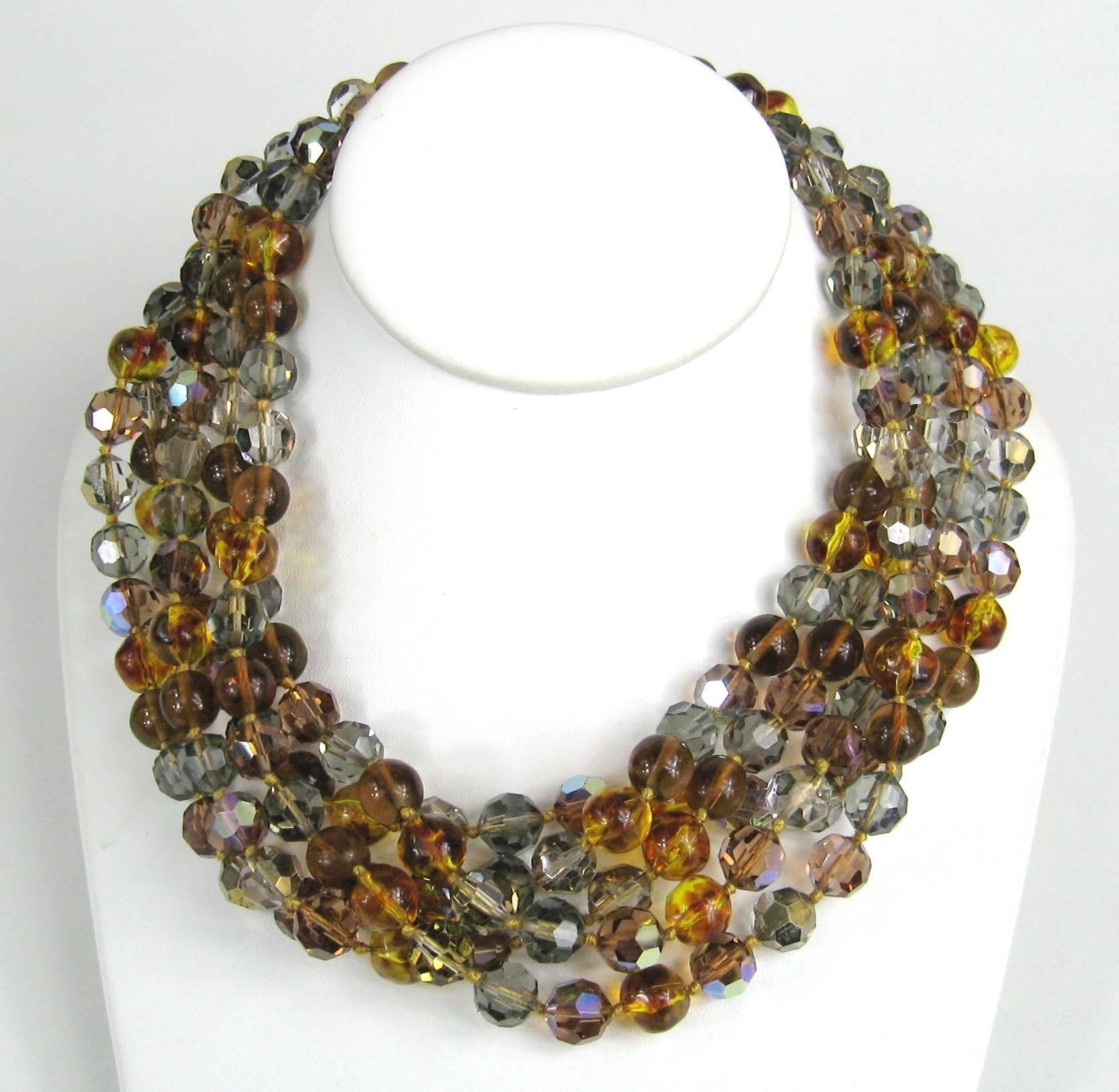 5 Strand Ombre Ciner Necklace. Purchased in the late 1980s and never worn. It has stunnignAmber, yellow to clear on the faceted beads. Measuring 19 inches end to end. Beads measure  9.5 mm. Still has Neiman Marcus tag attached. This is out of a