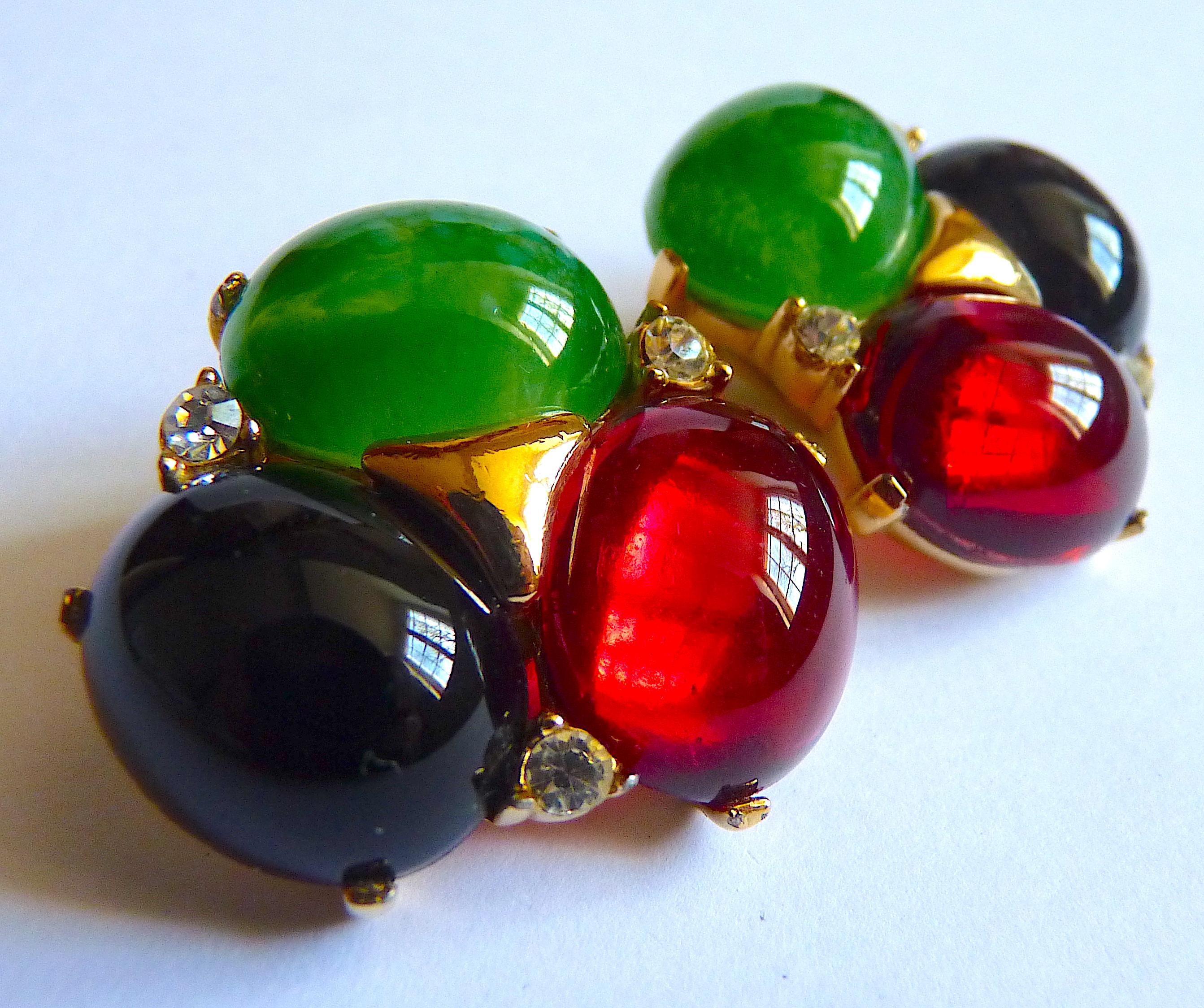 Signed Ciner poured glass clip on earrings, gold tone Metal and Red, Green, Black Poured Glass Cabochons, Ultra Rare Masterpiece and Highly Collectable ! Rare Vintage from the Mid Century

Stamped CINER at back of each clip

Excellent Vintage 