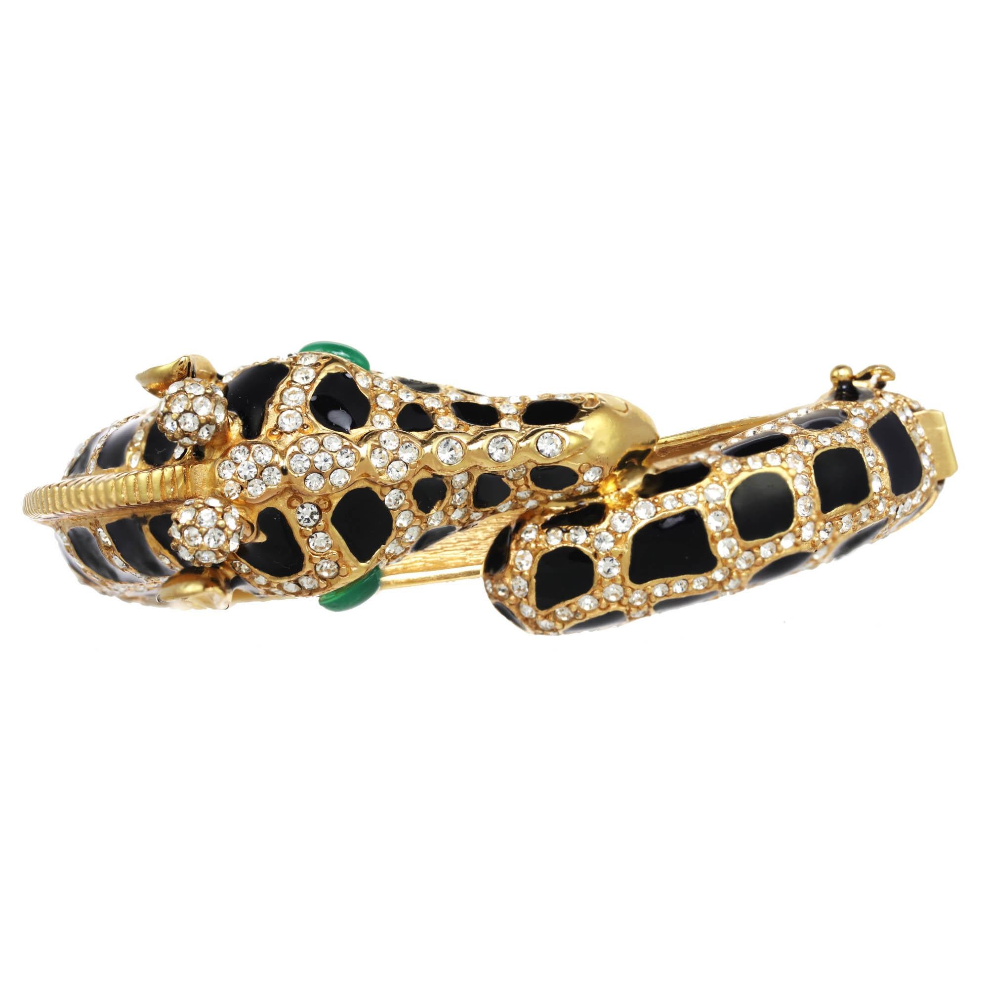 Bold and beautiful! This gold giraffe bracelet, with black enamel and crystal rhinestones, will be the perfect addition to your jewelry collection! 

PLEASE NOTE: The pieces available are not vintage and are not reproductions. 
CINER uses original