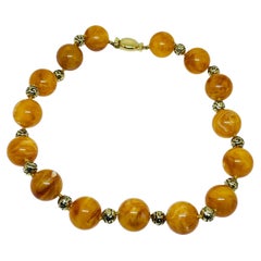 CINER signed vintage gold tone amber resin beaded designer necklace