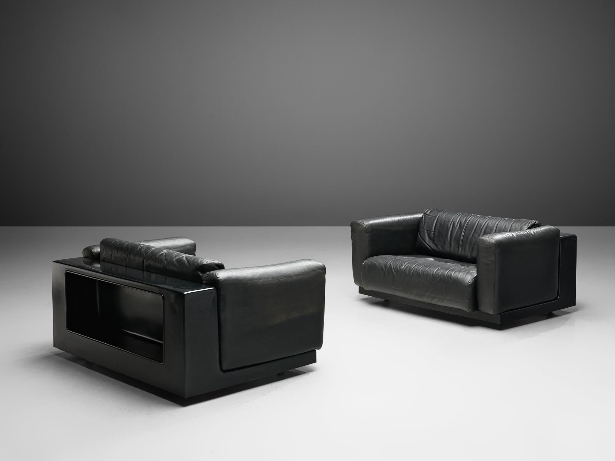 Cini Boeri for Knoll, pair of love seats, part of the 'Gradual' set, black leather, fiberglass, Italy, 1970s.

This pair of stunning black love seats was designed by Cini Boeri for Knoll and is part of the 'Gradual' sectional sofa. The design is