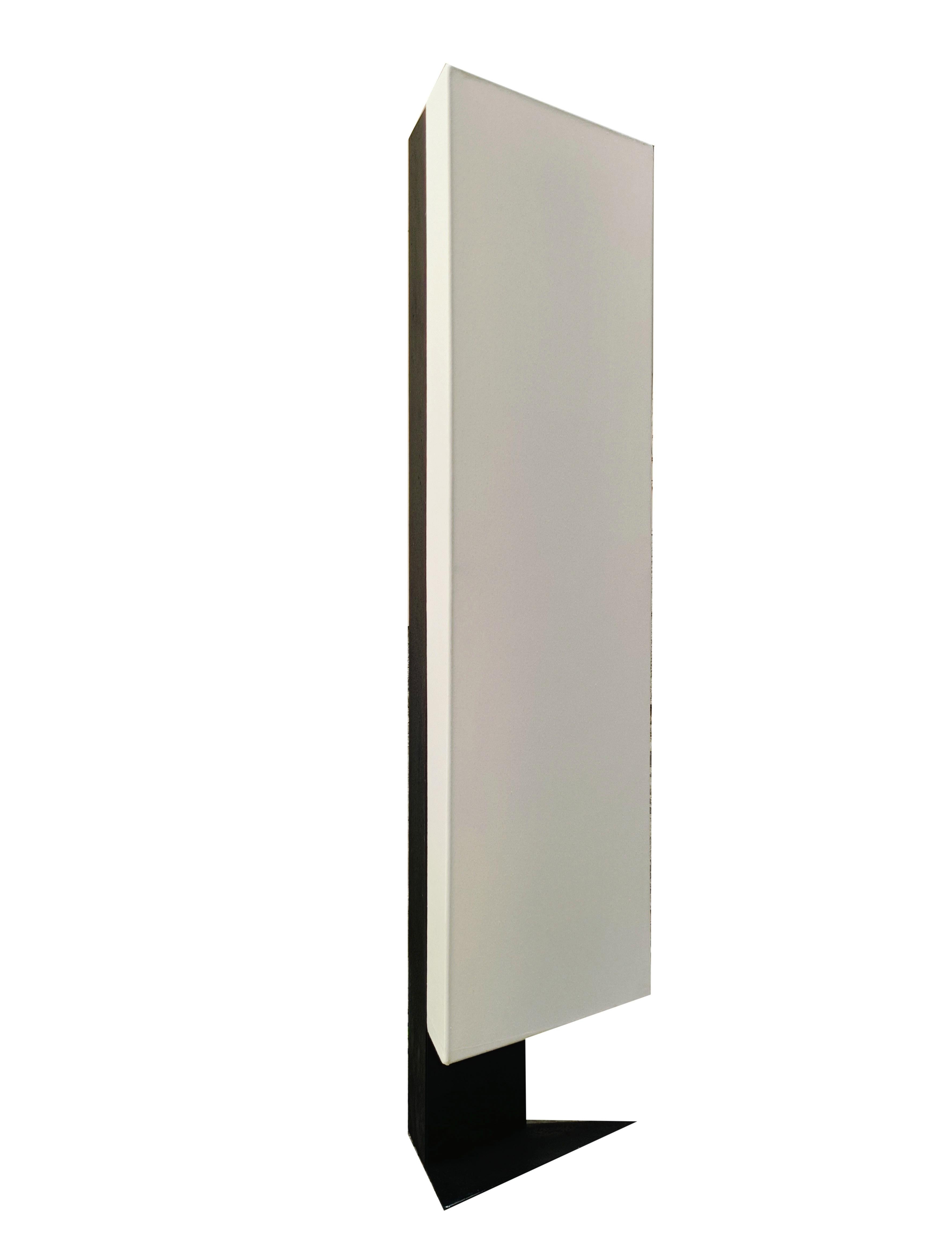 Floor lamp mod. Accademia designed and engineered by Cini Boeri for the famous Italian firm Artemide in the 1970s. The lamp frame is made of black painted metal and the fabric shade.
